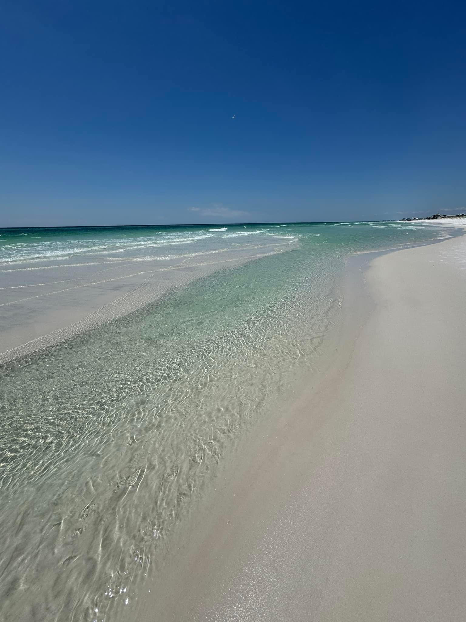 WaterSound Beach is a beautiful coastal community located along Scenic Highway 30A in Florida. This beach is known for its pristine white sandy shores, emerald green waters, and tranquil surroundings. 

WaterSound Beach offers a more secluded and serene atmosphere compared to some of the busier beaches in the area. It is characterized by its unique coastal dune lakes, which are a rare natural feature found along the Gulf Coast. These coastal dune lakes provide opportunities for paddleboarding, kayaking, and bird-watching.

The architecture in WaterSound Beach is inspired by traditional coastal designs, with charming beach cottages and luxury homes blending harmoniously with the natural surroundings. The community also features walking and biking paths, lush green spaces, and access to amenities such as swimming pools, fitness centers, and dining options.

Overall, WaterSound Beach on 30A offers a peaceful and picturesque setting for those looking to enjoy a relaxing beach experience away from the crowds.