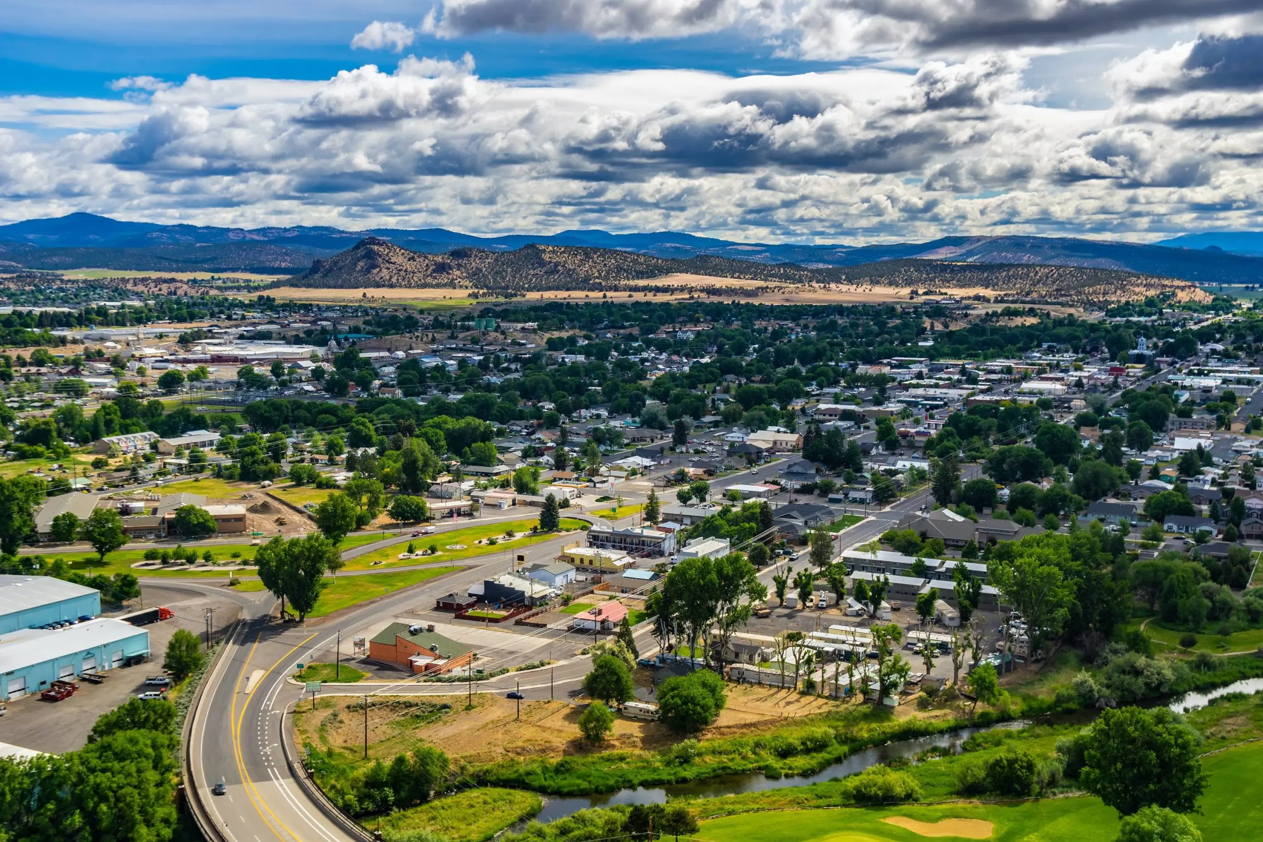<p><span style="font-size: 18px;font-family: Arial;"><strong>Discover Prineville, Oregon</strong></span></p>
<p><span style="font-family: Arial;">Welcome to <strong>Prineville, Oregon</strong>—a welcoming community nestled in the heart of Central Oregon. Known for its rich history and vibrant outdoor lifestyle, Prineville is a hidden gem worth exploring.</span></p>
<p><span style="font-family: Arial;"><em>Prineville</em> is the oldest city in Central Oregon and serves as the county seat for Crook County. With a blend of small-town charm and easy access to natural wonders, Prineville offers something for residents and visitors alike.</span></p>
<h2><span style="font-size: 18px;font-family: Arial;">Location</span></h2>
<ul>
<li dir = "auto"><span style="font-family: Arial;"><strong>Region:</strong> Central Oregon</span></li>
<li dir = "auto"><span style="font-family: Arial;"><strong>Population:</strong> Approximately 11,500</span></li>
<li dir = "auto"><span style="font-family: Arial;"><strong>Proximity:</strong> About 35 miles northeast of Bend, Oregon</span></li>
</ul>
<h3><span style="font-family: Arial;">History &amp; Culture</span></h3>
<ul>
<li dir = "auto"><span style="font-family: Arial;">Founded in <strong>1868</strong></span></li>
<li dir = "auto"><span style="font-family: Arial;">Historic downtown lined with 19th-century buildings</span></li>
<li dir = "auto"><span style="font-family: Arial;">Notable for its connection to the <strong>Oregon Trail</strong> and early pioneer heritage</span></li>
<li dir = "auto"><span style="font-family: Arial;">Home to the <strong>A.R. Bowman Museum</strong>, preserving local history</span></li>
</ul>
<h3><span style="font-size: 18px;font-family: Arial;">Outdoor Adventure</span></h3>
<p><span style="font-family: Arial;">Prineville is an ideal destination for outdoor enthusiasts. Enjoy:</span></p>
<ul>
<li dir = "auto"><span style="font-family: Arial;"><strong>Ochoco National Forest</strong>: Hiking, mountain biking, wildlife viewing</span></li>
<li dir = "auto"><span style="font-family: Arial;"><strong>Prineville Reservoir State Park</strong>: Boating, fishing, camping</span></li>
<li dir = "auto"><span style="font-family: Arial;"><strong>Smith Rock State Park</strong>: World-famous rock climbing and scenic views</span></li>
<li dir = "auto"><span style="font-family: Arial;">Miles of <strong>trails</strong> for horseback riding and off-road adventures</span></li>
</ul>
<h3><span style="font-size: 18px;font-family: Arial;">Local Economy</span></h3>
<ul>
<li dir = "auto"><span style="font-family: Arial;">Historically based on <strong>timber</strong> and <strong>ranching</strong></span></li>
<li dir = "auto"><span style="font-family: Arial;">Recent growth in <strong>tech industries</strong> (notably <strong>Facebook</strong> and <strong>Apple</strong> data centers)</span></li>
<li dir = "auto"><span style="font-family: Arial;">Supportive business community and vibrant local shops</span></li>
</ul>
<h3><span style="font-size: 18px;font-family: Arial;">Community Life</span></h3>
<ul>
<li dir = "auto"><span style="font-family: Arial;">Friendly, close-knit neighborhoods</span></li>
<li dir = "auto"><span style="font-family: Arial;">Excellent schools and a range of community events</span></li>
<li dir = "auto"><span style="font-family: Arial;"><strong>Crook County Fair</strong>, farmers’ markets, and lively seasonal festivals</span></li>
</ul>
<h2><span style="font-size: 18px;font-family: Arial;">Living in Prineville</span></h2>
<p><span style="font-family: Arial;"><strong>Pros:</strong></span></p>
<ul>
<li dir = "auto"><span style="font-family: Arial;">Affordable housing compared to other Central Oregon cities</span></li>
<li dir = "auto"><span style="font-family: Arial;">Plenty of year-round recreation</span></li>
<li dir = "auto"><span style="font-family: Arial;">Low crime rate</span></li>
<li dir = "auto"><span style="font-family: Arial;">Strong sense of community</span></li>
</ul>
<p><span style="font-family: Arial;"><strong>Cons:</strong></span></p>
<ul>
<li dir = "auto"><span style="font-family: Arial;">Limited nightlife</span></li>
<li dir = "auto"><span style="font-family: Arial;">Smaller range of dining and shopping options</span></li>
</ul>
<h2><span style="font-size: 16px;font-family: Arial;">Get to Know Prineville</span></h2>
<p><span style="font-family: Arial;">Whether you’re drawn to historic streets or the call of the wild, Prineville invites you to discover its unique blend of <strong>Western heritage</strong>, friendly faces, and endless possibilities under Oregon’s wide-open skies.</span></p>