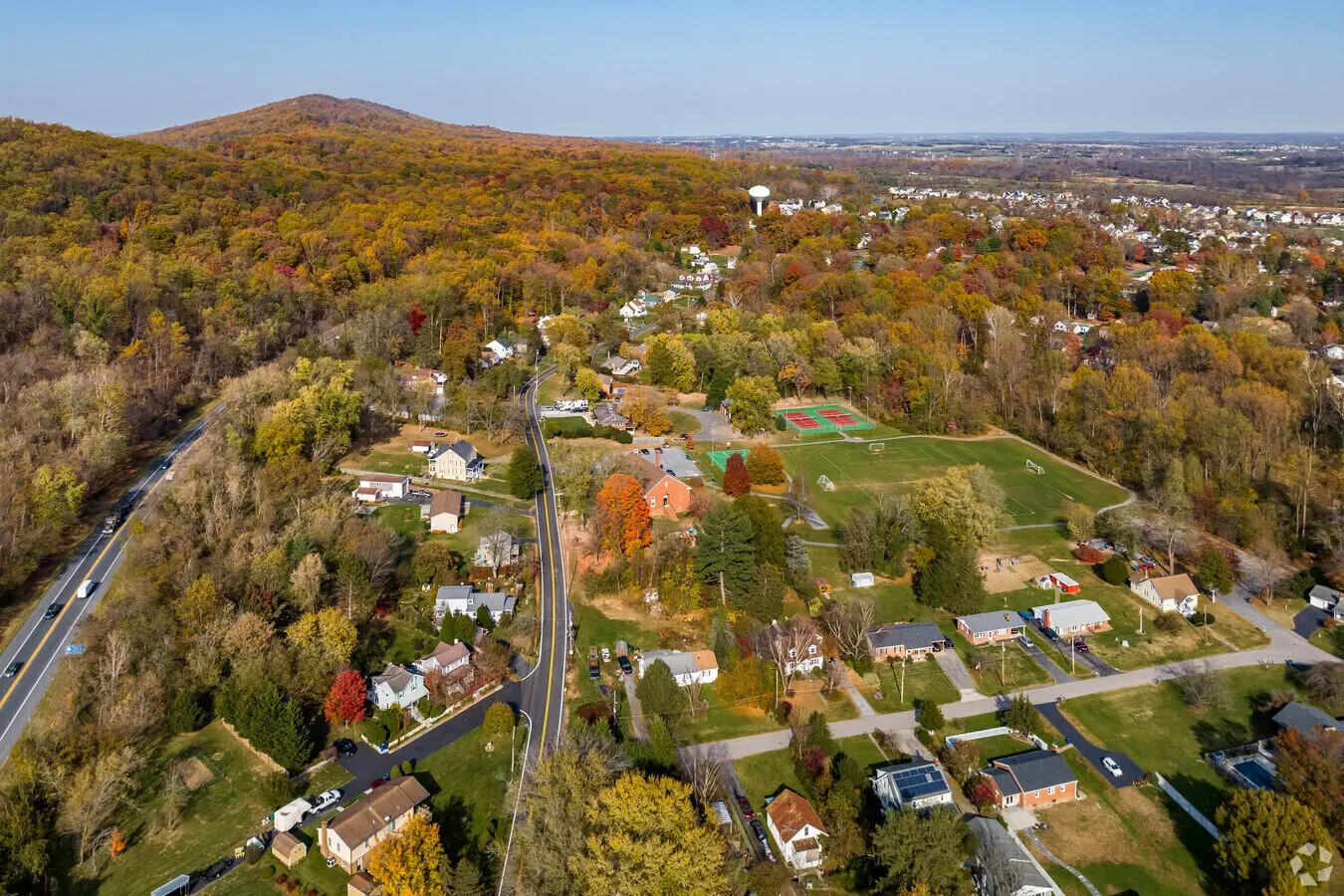 <p><span style="font-size: 18px;"><strong>Discover Adamstown, MD Real Estate</strong></span></p>
<h2><span style="font-size: 18px;">Welcome to Adamstown, Maryland</span></h2>
<p>Nestled in the heart of Frederick County, <strong>Adamstown, MD</strong> offers small-town charm with easy access to modern conveniences. Known for its picturesque landscapes, friendly community, and top-rated schools, Adamstown has quickly become one of Maryland’s most sought-after places to call home.</p>
<h2>Why Choose Adamstown, MD?</h2>
<p><strong>Adamstown real estate</strong> blends peaceful rural living with proximity to major employment hubs, historic attractions, and vibrant shopping and dining:</p>
<ul>
<li dir = "auto"><strong>Convenient Location</strong>: Only minutes from downtown Frederick, commuters appreciate quick access to I-270 and US Route 15, making trips to Washington, D.C., and Baltimore a breeze.</li>
<li dir = "auto"><strong>Stunning Natural Beauty</strong>: Enjoy rolling hills, scenic farmland, and parks such as <a href="https://www.recreater.com/Facilities/Facility/Details/Ballenger-Creek-Park-20" target="_self">Ballenger Creek Park</a> and the nearby <a href="https://www.nps.gov/choh/index.htm" target="_self">C&amp;O Canal National Historical Park</a>.</li>
<li dir = "auto"><strong>Top Schools</strong>: Served by the highly-rated Frederick County Public School system, Adamstown is perfect for families prioritizing education.</li>
</ul>
<h2>Real Estate in Adamstown</h2>
<p>Adamstown’s housing market offers a diverse array of properties to suit every lifestyle and budget:</p>
<h3>Home Styles</h3>
<ul>
<li dir = "auto"><strong>Spacious Single-Family Homes</strong></li>
<li dir = "auto"><strong>Modern Townhomes</strong></li>
<li dir = "auto"><strong>Historic Farmhouses</strong></li>
<li dir = "auto"><strong>New Construction Communities</strong></li>
</ul>
<h3>Features</h3>
<p>Many Adamstown homes feature:</p>
<ul>
<li dir = "auto">Large lots and private yards</li>
<li dir = "auto">Updated kitchens and bathrooms</li>
<li dir = "auto">Finished basements and bonus rooms</li>
<li dir = "auto">Community amenities like pools, playgrounds, and walking trails</li>
</ul>
<h2>The Adamstown Lifestyle</h2>
<h3>What Residents Love</h3>
<ul>
<li dir = "auto"><strong>Community Events</strong>: Seasonal festivals, farmers markets, and family-friendly gatherings foster a close-knit atmosphere.</li>
<li dir = "auto"><strong>Outdoor Recreation</strong>: Hike, bike, or paddle along miles of scenic trails and rivers.</li>
<li dir = "auto"><strong>Local Dining &amp; Shops</strong>: Explore charming local businesses and nearby retail centers in Frederick.</li>
</ul>
<h2>Find Your Dream Home in Adamstown, MD</h2>
<p>Whether you’re looking for a cozy starter home or an expansive estate, <strong>Adamstown, MD real estate</strong> offers something for everyone. With strong home values, a welcoming community, and easy access to all the amenities you need, Adamstown is an ideal place to settle down.</p>
<h3>Ready to Start Your Search?</h3>
<p><a href="https://www.realtor.com/realestateandhomes-search/Adamstown_MD" target="_self">Contact a local Adamstown real estate expert</a> today to discover available homes and learn more about this vibrant Frederick County gem!</p>