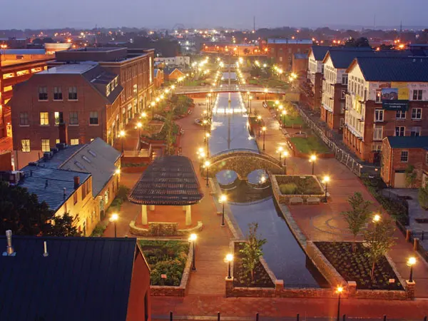 <p><span style="color: rgb(17,24,39);background-color: rgb(255,255,255);font-size: 18px;font-family: Clan Pro;"><strong>Discover Frederick, MD Real Estate</strong></span>&nbsp;</p>
<h3>Welcome to Frederick, Maryland</h3>
<p>Nestled just under an hour from both Washington, D.C., and Baltimore, Frederick, MD, is a dynamic city that perfectly balances historic charm with modern innovation. Known for its picturesque "Clustered Spires" skyline, vibrant Carroll Creek Promenade, and strategic location, Frederick is a highly desirable area for homeowners and investors alike.</p>
<h3>Why Buy Real Estate in Frederick, MD?</h3>
<h4>1. Strategic Location for Commuters</h4>
<p>Frederick is a true commuter hub, offering excellent connectivity via major routes:</p>
<ul>
<li dir = "auto">I-270 leads directly to the Washington, D.C. metro area.</li>
<li dir = "auto">I-70 connects to Baltimore and Western Maryland.</li>
<li dir = "auto">US-15 and US-340 offer easy access to Northern Virginia and West Virginia.</li>
<li dir = "auto">The MARC Commuter Train provides a convenient rail option to both D.C. and Baltimore.</li>
</ul>
<h4>2. Diverse Housing Options &amp; Communities</h4>
<p>Frederick's real estate market offers a wide variety of homes to suit every taste, from historic rowhouses in the walkable downtown to modern new construction in planned suburban communities. Popular areas include:</p>
<ul>
<li dir = "auto">Downtown Frederick: Historic homes, walkability, and proximity to arts and dining.</li>
<li dir = "auto">Urbana: A highly-rated planned community known for its excellent schools.</li>
<li dir = "auto">Ballenger Creek: Affordable options with easy access to major commuter routes.</li>
<li dir = "auto">Spring Ridge &amp; Worman's Mill: Established communities with amenities and green spaces.</li>
</ul>
<h4>3. Top-Rated Schools</h4>
<p>Frederick County Public Schools (FCPS) is highly regarded, with a large percentage of its schools receiving 4 or 5 stars on the Maryland Report Card. Families benefit from:</p>
<ul>
<li dir = "auto">A diverse and high-performing public school system.</li>
<li dir = "auto">Higher-than-average graduation rates.</li>
<li dir = "auto">Numerous options for private and specialized education.</li>
</ul>
<h4>4. Thriving, Stable Economy</h4>
<p>The city anchors a strong, diverse job market, particularly in high-growth sectors, ensuring stability and demand. Major employers and key industries include:</p>
<ul>
<li dir = "auto">Government &amp; Research: Fort Detrick, Frederick National Laboratory for Cancer Research.</li>
<li dir = "auto">Biotechnology &amp; Healthcare: Frederick Health Hospital, AstraZeneca.</li>
<li dir = "auto">Education: Frederick Community College, Hood College.</li>
</ul>
<h3>Lifestyle &amp; Amenities</h3>
<ul>
<li dir = "auto">Historic &amp; Cultural Hub: Stroll along the award-winning Carroll Creek Promenade, explore the unique boutiques and galleries, and enjoy the rich Civil War history at sites like the Monocacy National Battlefield.</li>
<li dir = "auto">Vibrant Downtown Dining: The city boasts a booming food scene, from historic pubs and craft breweries to upscale international cuisine.</li>
<li dir = "auto">Outdoor Recreation: Enjoy easy access to natural beauty, including hiking at Catoctin Mountain Park and local trails at Baker Park and the Monocacy River.</li>
</ul>
<h3>Real Estate Market Snapshot</h3>
<p>The Frederick real estate market is competitive, with a mix of stability and growth. While median home prices fluctuate, demand remains strong due to the city's popularity and strategic location. The market attracts both first-time buyers seeking affordability compared to the D.C. metro area and investors looking for strong rental demand and long-term appreciation.</p>
<h3><strong>Find Your Dream Home in Frederick, MD</strong></h3>
<p>Ready to discover why so many people are choosing Frederick, Maryland, as their next home? Whether you're interested in a historic property near the creek or a family home in a planned community, Frederick offers unparalleled quality of life and investment potential.</p>
<h3>Key Takeaways</h3>
<ul>
<li>Premier Commuter Location to D.C. and Baltimore.</li>
<li>Diverse Housing from historic to new construction.</li>
<li>Highly Rated Frederick County Public Schools.</li>
<li>Robust Economy in biotech, government, and healthcare.</li>
<li>Vibrant Lifestyle with arts, history, and nature.&nbsp;</li>
</ul>