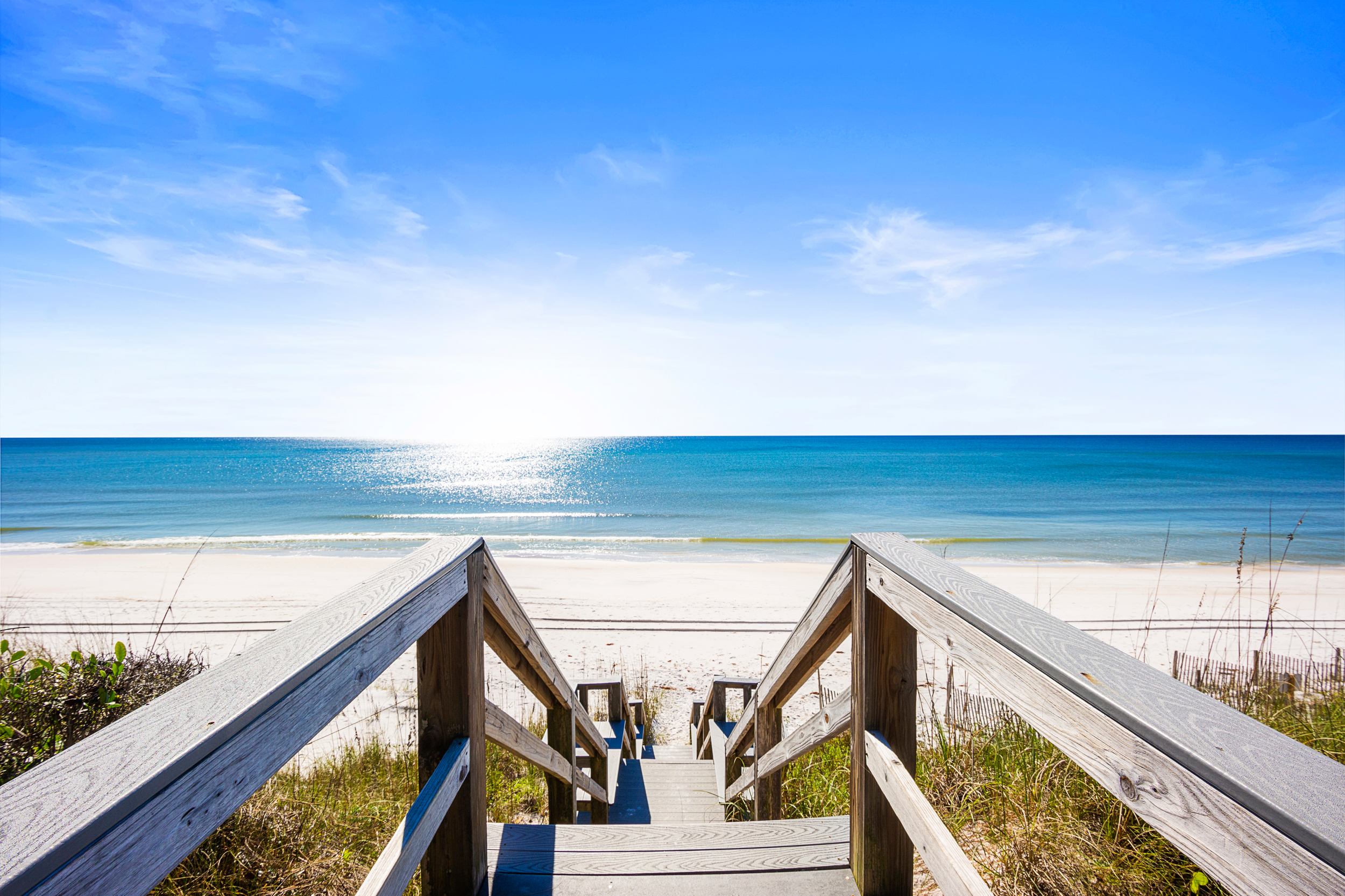 The creation of the Sand Cliffs neighborhood was not merely about constructing houses; it was about curating a lifestyle. Located along the pristine shores of the Gulf of Mexico, this gated enclave offers residents and visitors alike a perfect blend of beachfront living and privacy.

Residents of Sand Cliffs enjoy exclusive access to the neighborhood beach. There are two beach accesses located within the community and there is a path through the neighborhood to both. If you want to enjoy peace and quiet, this is the beachside community to do so!

But perhaps the most captivating aspect of Sand Cliffs is its sense of community. Arriving here feels like stepping into a close-knit seaside village, where neighbors become friends and every day feels like a vacation. Since the neighborhood is completely non-rental, the residents tend to all know each other, whether they live there full time or as a second home.

To experience Sand Cliffs is to experience peace, tranquility, and friendly neighbors.