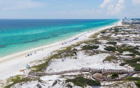 WaterSound FL is a picturesque beachfront community located on Highway 30A in Northwest Florida. It is known for its stunning natural beauty, luxurious amenities, and serene atmosphere.
WaterSound FL offers a unique coastal experience with its pristine white sandy beaches and crystal-clear emerald waters. The beachfront is generally less crowded compared to other popular destinations, allowing visitors to enjoy a more peaceful and relaxing environment.
The community itself is carefully planned and designed to blend harmoniously with the surrounding environment. It features a variety of upscale accommodations, including beachfront condos, vacation rentals, and private homes. Many of these properties offer breathtaking views of the Gulf of Mexico and access to private beach clubs.
One of the highlights of WaterSound FL is its emphasis on outdoor lifestyle. There are numerous pathways and boardwalks that wind through the community, leading visitors and residents to explore the natural dunes, wetlands, and coastal forests. These pathways are perfect for walking, jogging, or biking while immersing in the beauty of nature.
WaterSound FL also boasts world-class amenities, such as the WaterSound Beach Club and the Watersound Origins Golf Club. The Beach Club provides exclusive access to swimming pools, cabanas, restaurants, and a fitness center. The Golf Club offers an 18-hole course designed by Davis Love III, providing golf enthusiasts with a challenging and scenic playing experience.
The nearby town of Seaside, which is known for its vibrant atmosphere, unique shops, and delectable dining options, is just a short drive away. Visitors to WaterSound FL can easily explore the neighboring coastal communities along 30A, each with its own distinct charm.
Overall, WaterSound FL on 30A offers a tranquil retreat with pristine beaches, luxurious accommodations, and a range of outdoor and recreational activities. Whether you are seeking a relaxing beach vacation or an active getaway, this beautiful community provides an unforgettable experience.