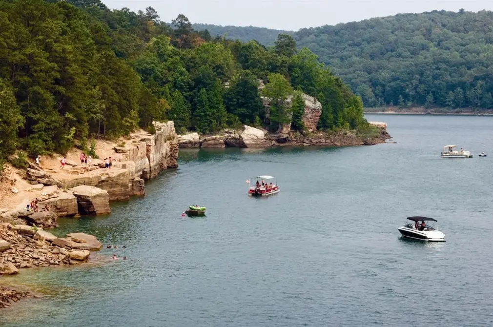 Welcome to the enchanting Greers Ferry Lake Area, a picturesque gem nestled in the heart of Arkansas, USA. This stunning locale encompasses two breathtaking lakes and a captivating gorge known as "The Narrows," offering visitors and residents alike a harmonious blend of natural beauty and recreational adventure. Spanning approximately 40,500 acres with over 340 miles of combined shoreline, the area is a paradise for outdoor enthusiasts and those seeking a serene escape.

The Greers Ferry Lake Area is renowned for its crystal-clear waters and abundant fishing opportunities, making it a favorite among anglers of all skill levels. With numerous hidden coves waiting to be discovered, there's always a new spot ready to reveal its aquatic treasures. Whether you're casting a line from a boat or shore, the thrill of a successful catch is never far away.

For boating aficionados, the expansive lakes offer a playground for watersports and leisurely cruises, with ample space to glide across the shimmering surface. Friends and family can gather for picnics on the shoreline or explore the tranquil inlets that showcase the region's breathtaking flora and fauna. 

As you wander through this charming area, you'll find picturesque vistas, inviting trails for hiking, and ample opportunities for wildlife observation, all set against the stunning backdrop of Arkansas's rolling hills and lush landscapes. The Greers Ferry Lake Area is not just a destination; it's a vibrant community where residents enjoy a relaxed pace of life, strong connections with nature, and an array of local events and gatherings throughout the year.

Whether you're an avid fisherman, a boating enthusiast, or someone looking to soak in the tranquility of the great outdoors, the Greers Ferry Lake Area promises a unique and unforgettable experience. Discover the charm, beauty, and recreational opportunities that make this region a true haven for nature lovers and those seeking adventure.