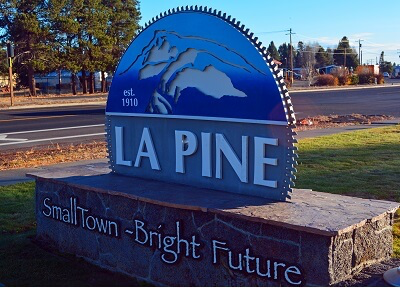 <p><span style="font-size: 18px;font-family: Arial;"><strong>Discover La Pine, Oregon</strong></span></p>
<p><span style="font-family: Arial;">Welcome to <strong>La Pine</strong>, a charming community nestled in the heart of Central Oregon. Whether you’re seeking outdoor adventure, peaceful small-town living, or a basecamp for exploring the Cascades, La Pine has something for everyone.</span></p>
<h2><span style="font-size: 18px;font-family: Arial;">About La Pine</span></h2>
<p><span style="font-family: Arial;">Located in <strong>Deschutes County</strong>, <em>La Pine</em> sits along the Little Deschutes River and is surrounded by high desert landscapes, lush pine forests, and crystal-clear lakes. With a population of around 2,500, the town prides itself on its friendly, tight-knit atmosphere and relaxed pace of life.</span></p>
<h2><span style="font-size: 18px;font-family: Arial;">Location</span></h2>
<ul>
<li dir = "auto"><span style="font-family: Arial;"><strong>Distance to Bend:</strong> 30 miles south</span></li>
<li dir = "auto"><span style="font-family: Arial;"><strong>Proximity to major highways:</strong> U.S. Route 97 runs directly through town</span></li>
<li dir = "auto"><span style="font-family: Arial;"><strong>Nearby attractions:</strong> Newberry National Volcanic Monument, Cascade Lakes, Paulina Peak</span></li>
</ul>
<h2><span style="font-size: 18px;font-family: Arial;">Lifestyle &amp; Community</span></h2>
<p><span style="font-family: Arial;">La Pine is known for its <em>laid-back vibe</em> and <em>welcoming residents</em>. The town regularly hosts community events such as farmer’s markets, holiday parades, and summer festivals. There’s a strong sense of local pride, with many residents volunteering in local organizations or attending city gatherings.</span></p>
<h3><span style="font-family: Arial;">Community Highlights</span></h3>
<ul>
<li dir = "auto"><span style="font-family: Arial;"><strong>Weekly Farmer’s Market</strong></span></li>
<li dir = "auto"><span style="font-family: Arial;"><strong>La Pine Frontier Days</strong> (annual celebration)</span></li>
<li dir = "auto"><span style="font-family: Arial;"><strong>Friendly, locally owned shops and cafes</strong></span></li>
<li dir = "auto"><span style="font-family: Arial;"><strong>Active volunteer community</strong></span></li>
<li dir = "auto"><span style="font-family: Arial;"><strong>Excellent schools</strong> as part of the Bend-La Pine School District</span></li>
</ul>
<h2><span style="font-size: 18px;font-family: Arial;">Outdoor Recreation</span></h2>
<p><span style="font-family: Arial;">One of La Pine’s greatest draws is its unparalleled access to outdoor recreation. Some favorite activities include:</span></p>
<ul>
<li dir = "auto"><span style="font-family: Arial;"><strong>Fishing &amp; Boating:</strong> Numerous lakes and rivers, including Wickiup Reservoir and Crane Prairie Reservoir</span></li>
<li dir = "auto"><span style="font-family: Arial;"><strong>Hiking &amp; Biking:</strong> Trails in the Deschutes National Forest and Newberry National Volcanic Monument</span></li>
<li dir = "auto"><span style="font-family: Arial;"><strong>Camping:</strong> Nearby campgrounds and RV parks</span></li>
<li dir = "auto"><span style="font-family: Arial;"><strong>Winter Sports:</strong> Snowmobiling, cross-country skiing, and snowshoeing in the surrounding forests and near Mount Bachelor</span></li>
</ul>
<h2><span style="font-size: 18px;font-family: Arial;">Real Estate &amp; Living</span></h2>
<p><span style="font-family: Arial;">La Pine offers a range of housing options, from cozy cabins and affordable starter homes to large plots of rural land. <strong>Home prices</strong> are generally lower than in nearby Bend, making it an attractive destination for families, retirees, and remote workers.</span></p>
<h2><span style="font-size: 18px;font-family: Arial;">Notable Local Spots</span></h2>
<ul>
<li dir = "auto"><a href="https://stateparks.oregon.gov/index.cfm?do=park.profile&parkId=32" target="_self"><span style="font-family: Arial;"><strong>La Pine State Park</strong></span></a><span style="font-family: Arial;"> – river trails, campsites, and wildlife watching</span></li>
<li dir = "auto"><a href="https://www.harvestdepotlapine.com/" target="_self"><span style="font-family: Arial;"><strong>The Harvest Depot</strong></span></a><span style="font-family: Arial;"> – a favorite local café and bakery</span></li>
<li dir = "auto"><span style="font-family: Arial;"><strong>The La Pine Community Center</strong> – the hub for local events and classes</span></li>
<li dir = "auto"><a href="https://www.fs.usda.gov/recarea/deschutes/recarea/?recid=3859" target="_self"><span style="font-family: Arial;"><strong>Paulina Peak</strong></span></a><span style="font-family: Arial;"> – stunning vistas of the entire region</span></li>
</ul>
<h2><span style="font-size: 18px;font-family: Arial;">Why Choose La Pine?</span></h2>
<ul>
<li><span style="font-family: Arial;"><strong>Affordable living</strong> compared to other Central Oregon towns</span></li>
<li><span style="font-family: Arial;"><strong>Friendly, small-town atmosphere</strong></span></li>
<li><span style="font-family: Arial;"><strong>Proximity to endless outdoor adventures</strong></span></li>
<li><span style="font-family: Arial;"><strong>Growing community with expanding amenities</strong></span></li>
</ul>