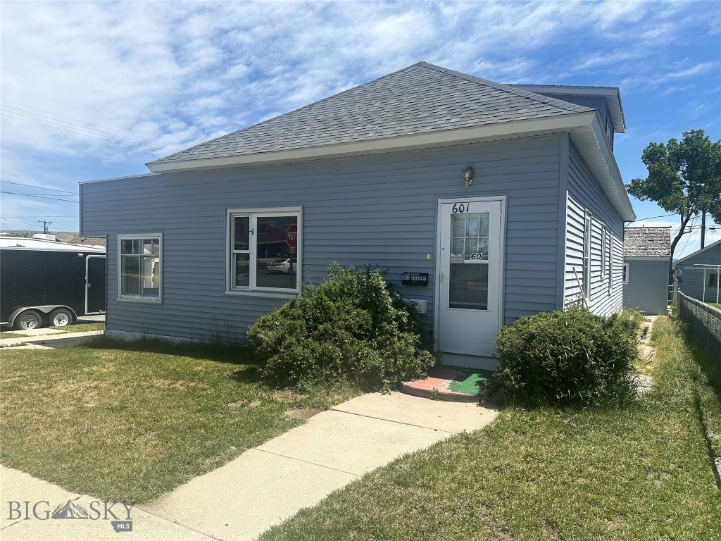 Attention Investors, Flippers & Contractors! Opportunity awaits with this 2-bedroom, 1-bath home offering approximately 1,280 square feet of living space on a corner lot with a detached single-car garage. Ready for a full interior restoration, this property features maintenance-free siding and recently replaced roofs on the home and covered porch, providing a head start on your renovation. The functional floor plan and generous square footage offer an excellent opportunity to reimagine the space and add value. Whether you're looking for your next flip, rental property, or investment project, this home has the potential to become something special. Property is being sold AS IS. Bring your vision and unlock this property's potential.