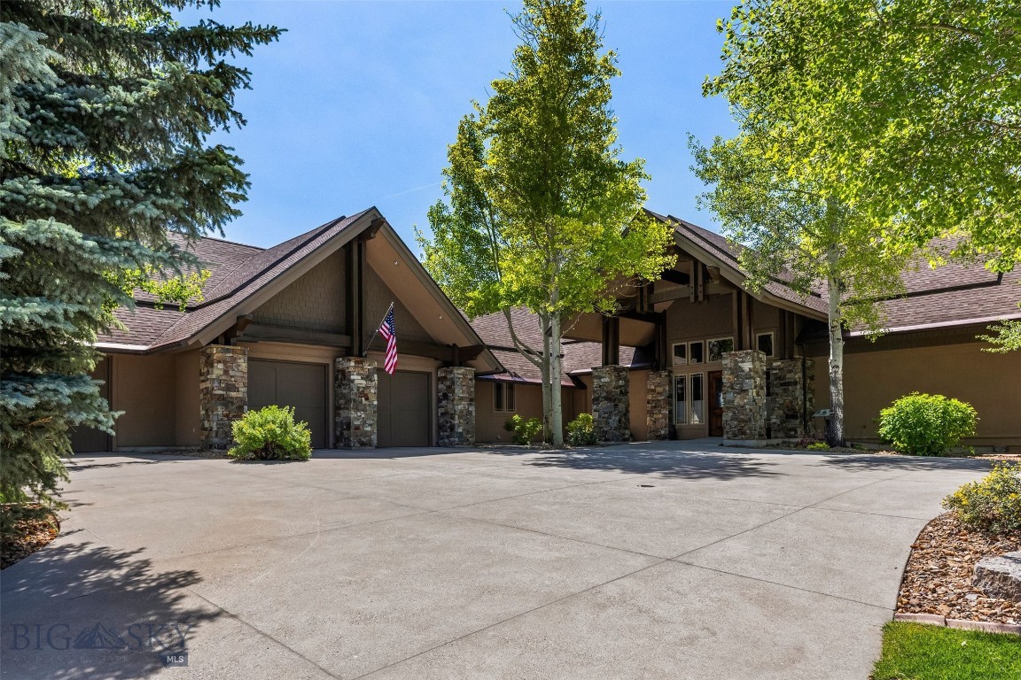 Offered for the first time, this extraordinary estate presents a rare opportunity to own one of Bozeman's most spectacular homes. Designed by renowned architect Nick Fullerton and expertly executed by Aldworth Construction, every detail was attended to. Massive reclaimed trestle beams from the Great Salt Lake and over 350 tons of Montana-quarried stone lend impressive scale, while thoughtfully composed spaces create warmth and intimacy in equal measure.

Tucked against the foothills of the Bridger Mountains on the 13th hole of Bridger Creek Golf Course, the residence commands sweeping southern views across the valley to the Gallatin Range, Spanish Peaks, and Tobacco Roots. Set on two separate lots spanning more than 1.5 acres, the grounds are meticulously landscaped—kept, some would say, even better than the course itself—and approached by a heated driveway that makes Montana winters effortless.

Inside, more than 6,200 square feet of generously scaled living unfolds beneath vaulted ceilings, anchored by handcrafted stonework, rich timber, and a gas fireplace at the heart of the living space. The kitchen is appointed for the serious cook and gracious host alike, with dual wall ovens, a cooktop, a wine fridge, and a wet bar for entertaining. Radiant floor heat, central air, and integrated low-voltage lighting controls bring modern comfort and effortless ambiance to every room, while the serene primary suite offers walk-in closets and a spa-like bath.

Thoughtfully designed for a lifetime, the home allows you to move about the entire property without encountering a single step. An elevator connects the main level to a walk-out lower level built expressly for entertaining—home theater, billiards room, and kitchenette opening to additional outdoor living space and a gently sloping lawn, ready for game nights, gatherings, and guests.

Outdoor living is a highlight in its own right, with an array of covered decks, patios, and balconies framing the mountains and fairway beyond—the perfect vantage for morning coffee or evening cocktails as alpenglow settles over the peaks. A nearly 2,000-square-foot garage and abundant storage, inside and out, accommodate vehicles, gear, and the full complement of Montana toys, while world-class golf, fishing, hiking, and trails wait just beyond the door.

A singular blend of scale and intimacy, craftsmanship and comfort, this is a legacy property for those who accept nothing less than the very best of Bozeman living.