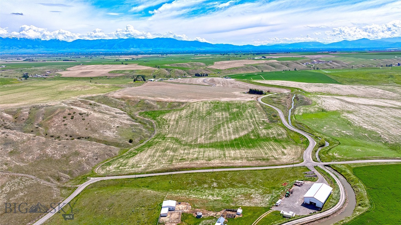 Own your slice of rural paradise with this rare gem in Churchill. 81+ beautiful acres of farm land just minutes outside of Manhattan. 360 degree views of the mountains and surrounding hillsides.  Rolling hills and south facing slopes with a portion of prairie land make this a must see. There is a restrictive covenant on the property that deems it unable to be subdivided or developed. Potential for building your dream home, dryland farming by owner, or leased to another farmer.  Canal Road forms south boundary, and Prairie Road forms a portion of the west boundary.  They don't make land like this anymore!