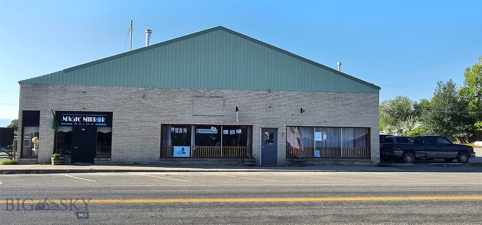 Commercial Property For Sale!!
Located in the heart of Ennis and just a stones throw from the Famous Madison River, is a rare opportunity to own 6694+/- sq ft of versatile commercial space in one of Montana’s most scenic and thriving communities. Whether you need retail, office, storage, or warehouse space, this property offers the potential to support a variety of business uses. 
Featuring a spacious open layout, 2 bathrooms, and multiple separate rooms, the building offers excellent flexibility for various business operations or multi-tenant use.  A small portion of the building is currently leased to a salon, while the other side was previously used as a pre-school, just an indication of this space’s rental income potential
This high visibility location enjoys steady traffic from both locals and tourists.