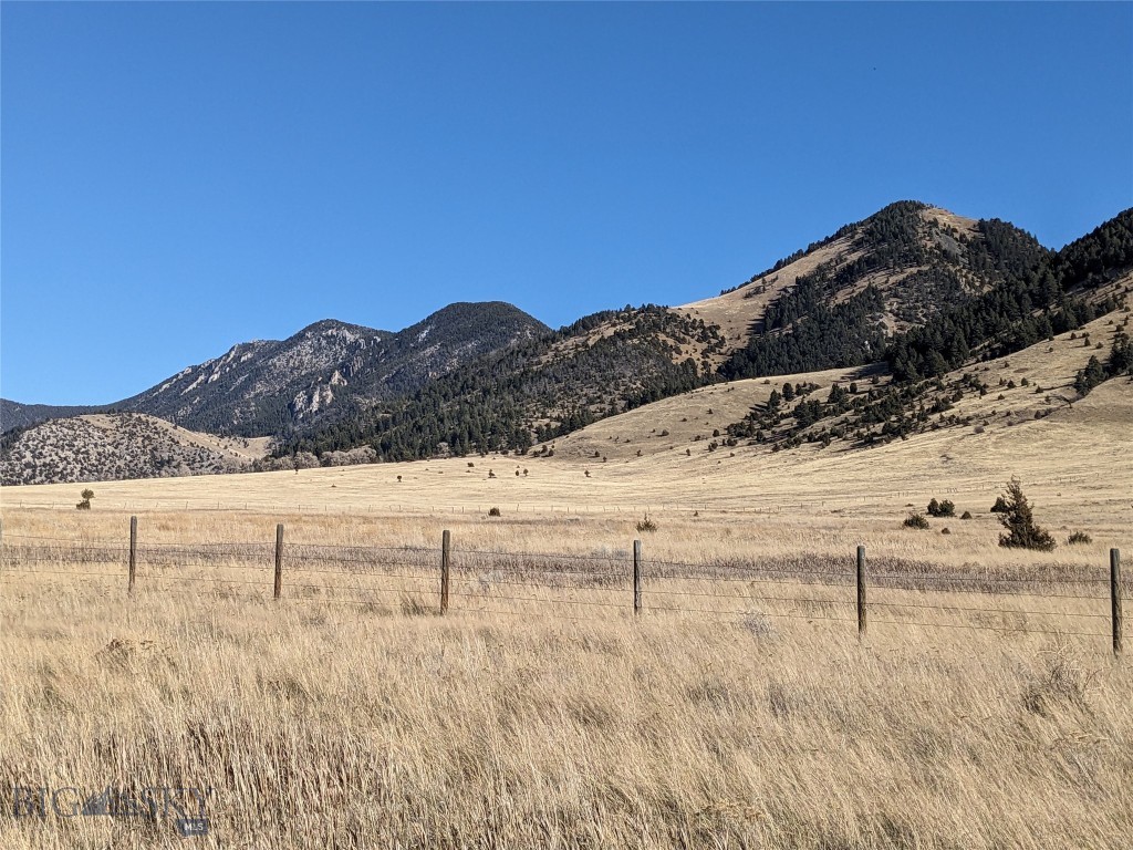 86-A Songbird Lane | Ennis, Montana

A truly rare opportunity to own a 5.49-acre homesite with the Beaverhead-Deerlodge National Forest bordering the entire eastern boundary. Properties of this size with direct National Forest access are exceptionally difficult to find, offering the freedom to step from your own land into thousands of acres of protected public lands without ever getting in your vehicle.

Located at the end of McDeed Creek Road in Mustang Ranches, this newly platted parcel enjoys outstanding privacy, breathtaking views of the Madison Range and surrounding mountains, and immediate access to the Lee Metcalf Wilderness. Whether your passion is hiking, horseback riding, hunting, backcountry skiing, or simply exploring Montana