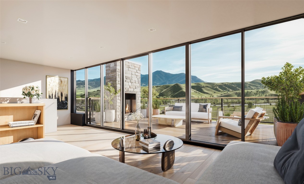 Introducing Bozeman Yards — Bozeman’s most exceptional new address and the highest standard of luxury construction available on the market. Perfectly positioned in the heart of the vibrant Mill Arts District on the Northeast side, Bozeman Yards offers an unrivaled living experience where world-class design, premium finishes, and curated amenities come together in a way that no other development in town can match. These architecturally striking condos feature elevated finishes inspired by Montana’s natural beauty, with oversized windows framing panoramic Bridger Mountain views - each interior space is matched with an equally appealing outdoor space designed for year-round enjoyment. Residents enjoy exclusive access to The Yards Club, a one-of-a-kind private spa and wellness retreat featuring a plunge pool, sauna, cold plunge, fitness studio, and owner’s lounge. With thoughtfully designed landscaping, nearby trail systems, and walkability to both downtown Bozeman and Story Mill Park, this is the most connected, design-forward, and amenity-rich living experience available. Reserved parking, private storage, and a community-focused design complete the vision—Bozeman Yards is truly defining a new standard of excellence. Bozeman Yards 203 is a stunning 2 bed, 2 bath residence featuring an outdoor terrace designed for sophisticated entertaining. Buyers can select from an array of designer-curated finish packages to create their ideal living environment. Crafted for seamless flow and optimal function, the open-concept layout showcases unobstructed Bridger Mountain vistas through large picture-frame windows that elegantly integrate indoor and outdoor living. Call today to learn more about Bozeman Yards!