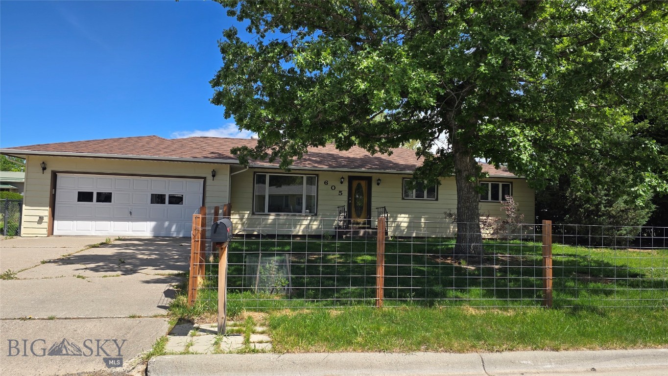 Welcome to this inviting single-family home on the desirable south side of Livingston, Montana. Featuring 3 bedrooms and 2 bathrooms, this single-level home offers a comfortable and functional layout perfect for everyday living. The spacious living room is filled with natural light, thanks to large windows that frame beautiful views and create a warm, open feel. Sliding glass doors off the dining area lead directly to the large back deck, making indoor-outdoor living and entertaining a breeze. The kitchen offers plenty of storage along with a dedicated pantry, providing both convenience and organization. Step outside to a fully fenced yard—ideal for pets, gatherings, or relaxing under the big Montana sky. A huge bonus is the roof was replaced in 2025! A two-car garage adds practicality, while mountain views complete the picture. Located in a quiet neighborhood with easy access to all that Livingston has to offer, this home captures the best of Montana living.