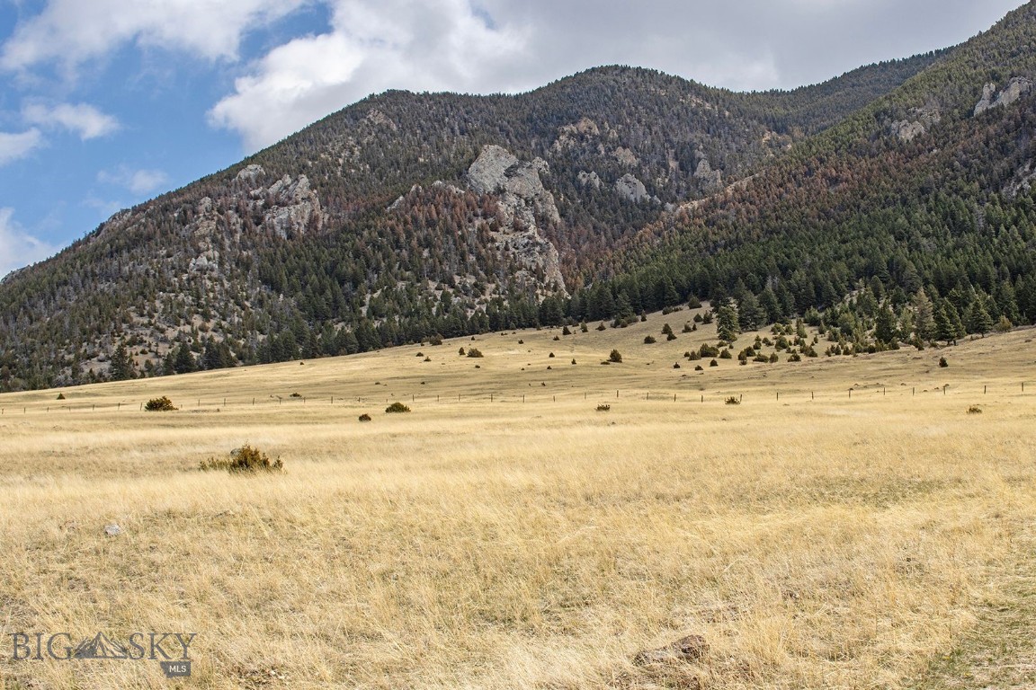 Incredible 10+ Acre Parcel Bordering National Forest – Build Your Montana Dream.  Welcome to your Montana getaway! This exceptional 10+ acre property is nestled at the base of the Madison Range and Lee Metcalf Wilderness, offering direct access to National Forest right out your back door. Enjoy stunning views of the Madison Valley and surrounding mountain ranges from your future home or cabin.  

With end-of-the-road privacy and abundant wildlife—you’ll experience the true Montana lifestyle. Bring your horses, or side by side and explore. Just minutes from downtown Ennis, the Madison River, and the Ennis Airport, this property combines seclusion with convenience. Whether you're looking for a year-round residence or a vacation retreat, this rare parcel offers unmatched recreational opportunities, stunning scenery, and the true Montana lifestyle.
Don’t miss this chance to own a slice of Big Sky Country!