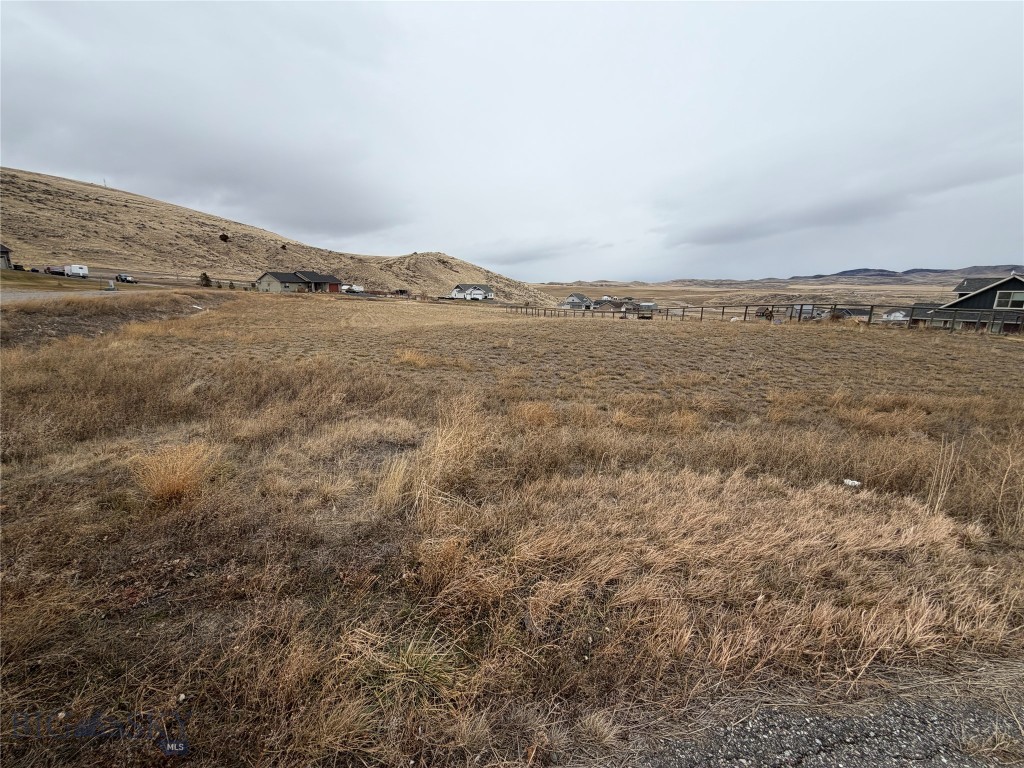 360 degree views from this 1.08 acre property located at the Village at Elk Ridge. Plenty of room to build your dream home and easily accessible to several nearby cities. Located in the small town of Three Forks that has restaurants and shopping plus a short drive to Bozeman, Belgrade, Butte and Helena. This neighborhood offers a multi acre community park with gazebo and picnic area along with a baseball field, soccer field, and paved roads. Multiple outdoor activities with the confluence of the Madison, Jefferson, and Gallatin Rivers creating the headwaters of the Missouri River. Three Forks has a golf course and plenty of options for camping, biking, hiking, fishing & more. Call your agent today for a showing.