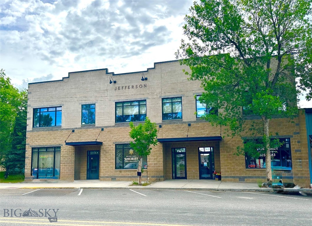 Elevate your business with this exceptional second-floor commercial office suite in the heart of downtown Three Forks. Offering excellent visibility and accessibility, the property features convenient access from both Main Street and the rear alley, along with two dedicated parking spaces in the building