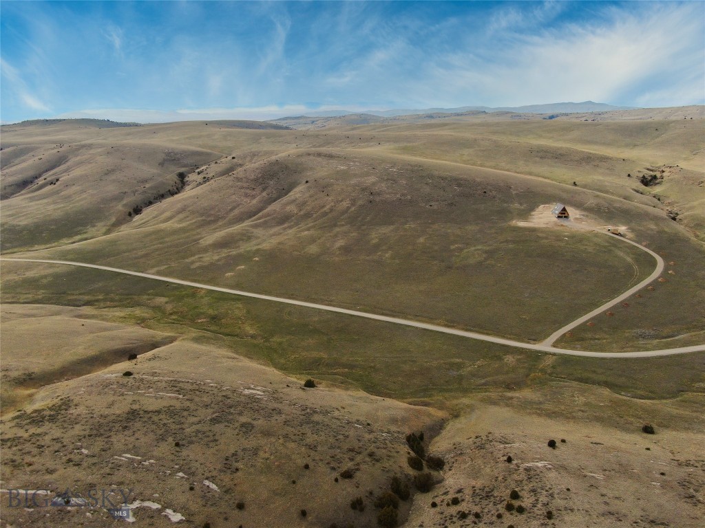 Discover your slice of Montana with this 20-acre parcel in Gallatin River Ranch. Surrounded by breathtaking mountain views, wide open skies, and abundant wildlife, this property offers the ideal blend of privacy and natural beauty. Enjoy pristine, private river access and the added benefit of bordering state land, giving you even more space to explore right out your back door. Whether you’re looking to build now or plan for the future, the seller has already drafted house plans to help bring your vision to life. This is a rare opportunity to create your Montana dream in a truly peaceful setting. Info deemed reliable but not guaranteed. Buyer/buyer agent to verify.
