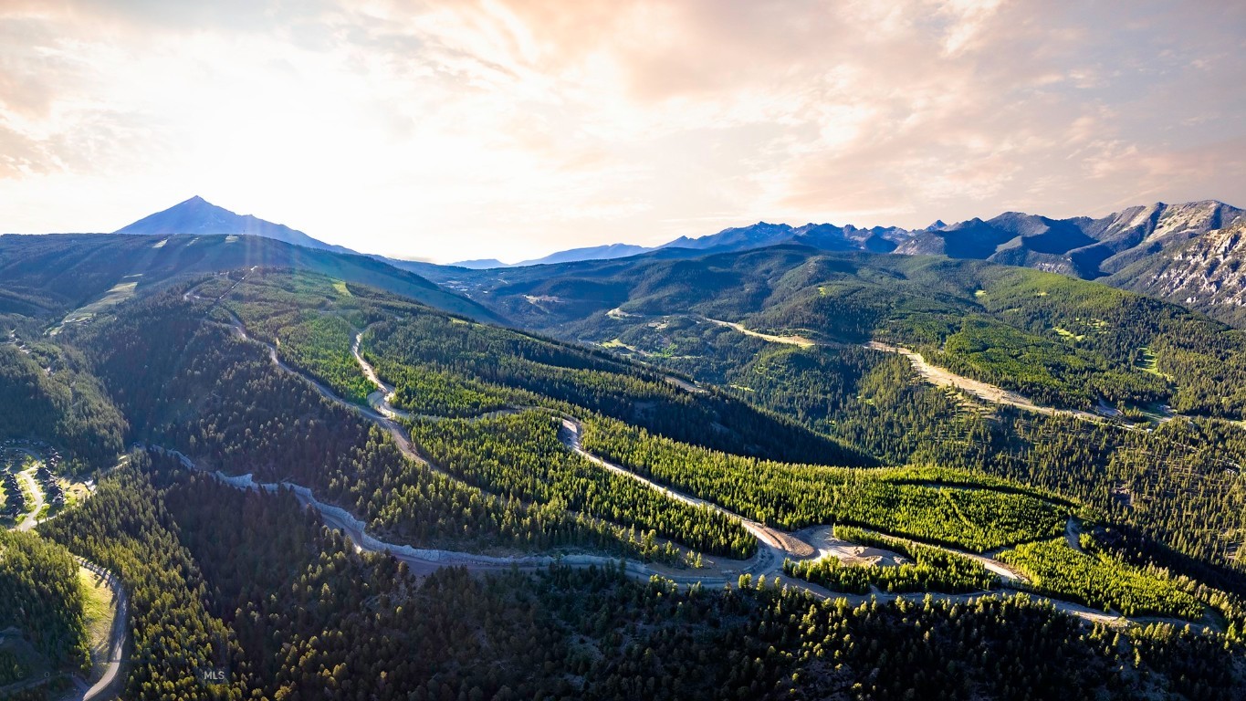 Discover Powdercrest, the final land release for custom-built homes within Spanish Peaks Mountain Club. This remarkable new neighborhood introduces 31 exceptional homesites—an exclusive opportunity to own among the last true ski-in, ski-out properties in one of Big Sky’s premier, members-only communities. Lot 22 is 3.49 acres and features Spanish Peaks views, privacy, and an impressive location.

Spanning the slopes of Flatiron Mountain, these generously sized parcels offer a rare balance of privacy, expansive views, and future direct lift access via a planned chairlift. Owners will step seamlessly onto the slopes of Big Sky Resort while enjoying a sense of space and seclusion seldom found in world-class alpine destinations.

Positioned along a dramatic ridgeline with unobstructed mountain panoramas, each homesite is thoughtfully sited to capture abundant natural light, jaw-dropping views, close trail access, and year-round outdoor living. Ownership includes access to an exceptional collection of current and future amenities, including dining, two Weiskopf-designed golf courses, the Spanish Peaks Clubhouse, Montage Big Sky, the highly anticipated Member Lodge Aspire, and an expanding ski network, all contributing to an already unmatched mountain lifestyle. Combined with close proximity to Big Sky’s vibrant Town Center and the untamed wilderness of Yellowstone National Park, this is truly an opportunity not to be missed.

Owners may choose between Social or Signature Golf membership at Spanish Peaks Mountain Club, joining an outdoor-focused community of like-minded mountain enthusiasts from around the world. To further streamline the path to ownership, buyers may also take advantage of the highly regarded Design Build Program.

This represents the final opportunity to create a custom legacy residence at the heart of Spanish Peaks—where world-class recreation, protected open space, and authentic alpine character define one of the most coveted addresses in Big Sky, Montana.