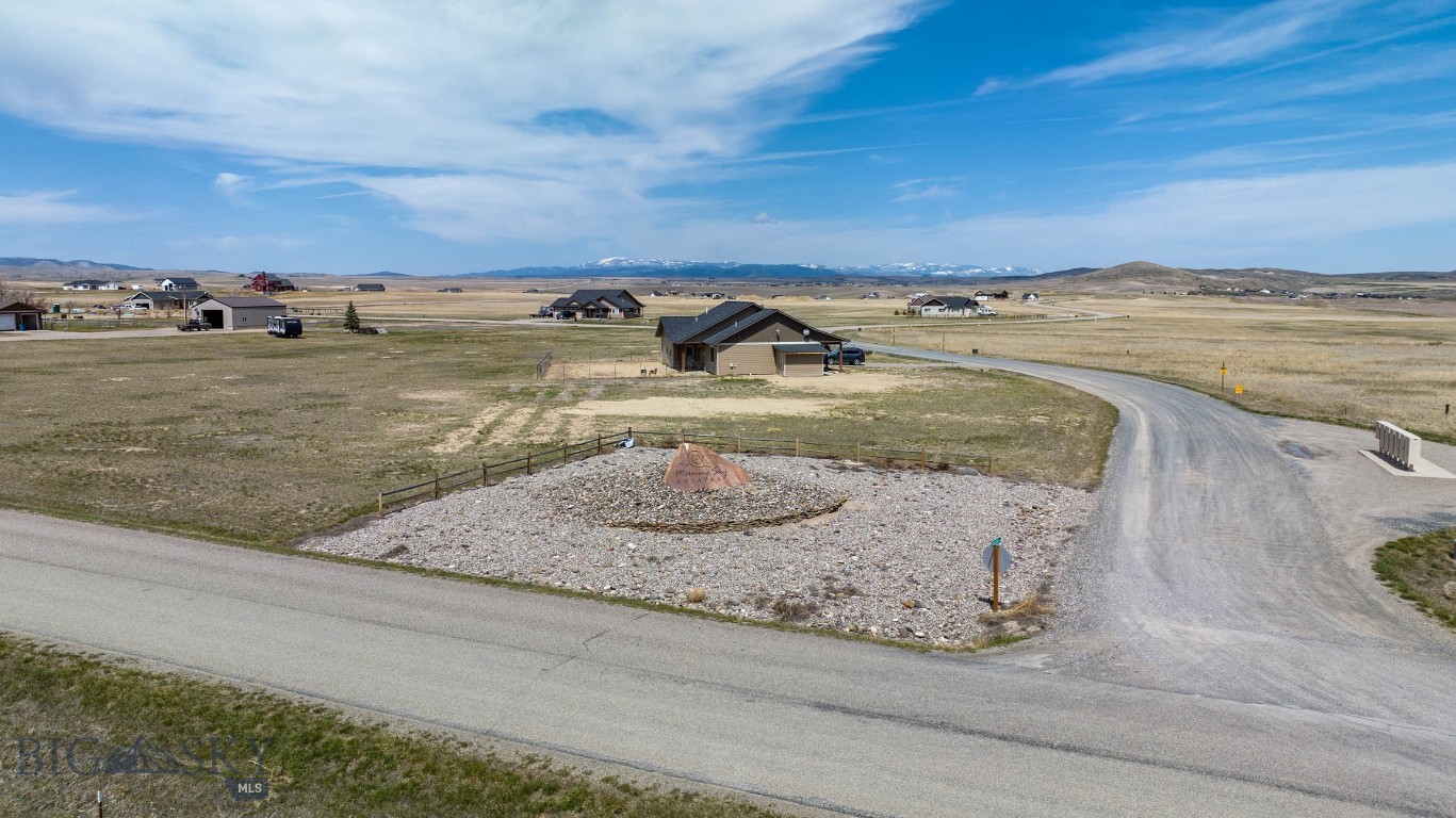 This 3.5-acre, build-ready lot offers a rare opportunity to own a piece of Montana’s picturesque landscape. Backing onto 7.5 acres of community park space, the property serves as a gateway to the Copper City trail system and the renowned fishing waters of Three Forks. Situated amidst breathtaking natural beauty, this lot boasts panoramic views of the surrounding mountain ranges. Imagine waking up to the serene vistas each morning and relishing in the tranquility of your private oasis. Whether it's exploring the nearby Copper City trail system, marveling at the wonders of Lewis & Clark Caverns State Park, or indulging in fishing along the renowned rivers that grace Three Forks, MT, there's something here for every outdoor enthusiast. Moreover, the convenience of this location cannot be overstated. Just a stone's throw away from the charming town of Three Forks, MT, you'll have easy access to local favorites such as golf courses, restaurants, and various activities. Additionally, with Bozeman Yellowstone International Airport (BZN) a mere 29 miles away, travel becomes a breeze. Before you start envisioning your dream home, it's important to note that this build-ready lot requires a few steps for construction commencement. Securing necessary permits from the Broadwater County Sanitarian for septic installation and obtaining approval from the Design Review Committee (HOA) are essential first steps. Rest assured, electricity is readily available on-site, while the responsibility of installing a private well, septic system, and propane tank service falls upon the buyer. While there's no zoning in place, an active HOA ensures the maintenance of community standards through recorded Covenants and Bylaws, safeguarding your investment for years to come. If you're ready to take the next steps towards making this property yours, don't hesitate to reach out to me or your preferred Realtor for further information and assistance. Your dream home awaits—seize this opportunity to create a lifetime of memories in the heart of Montana's picturesque landscape.