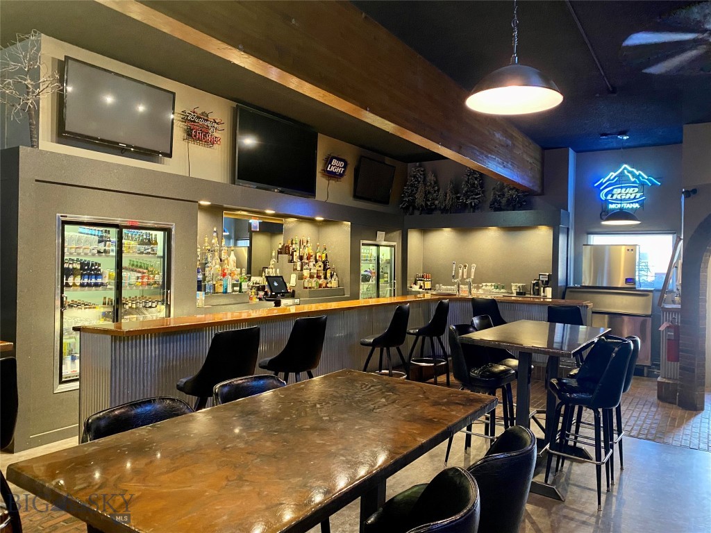 Come on in and enjoy the air conditioning on a hot summer’s day! The drinks are cold, and the food is hot. The Alibi Lounge and restaurant is a turn-key establishment meticulously kept up by current owners. The clean business features a corrugated wrapped bar in the lounge and warm lighting and welcoming décor in the restaurant dining space. The eye-catching arched doorways elevate any weary spirit and are a timeless symbol of celebrating success and stability! A full liquor license accompanies the sale. The Alibi is situated on Main Street of Shelby, Montana where travelers pass through looking for a resting point to grab some food. Located next to the Alibi Lounge is a beauty shop on the corner that is connected and is part of the property. The beauty shop has been rented by the same tenant for numerous years. This rental income is currently at $450/month. Essentially everything is included in the sale such as furnishing, the inventory, the appliances, and the décor. Starting out on a new venture? This place has you covered! With books that can back it up. Come down to the Alibi and let your vision of owning a successful business come alive!