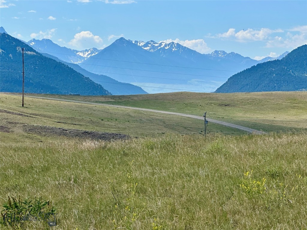 Great Livingston, Montana location with views into Paradise Valley. Less than 60 miles to Yellowstone National Park. Gorgeous ~10 acres with panoramic Absaroka Mountain views. This property offers very nice, useable acreage that is ideal for a family retreat, Airbnb location, or stunning equestrian property. Zoned County and adjacent to City Limits. NO COVENANTS. Be creative with uses - residential, rentals, commercial via application process with County Planning. Access is at the intersection of Sun Ave and Northern Lights Road. This great property is ~60 miles from Yellowstone National Park. All photos are taken on the lot. Possible owner financing with large down.