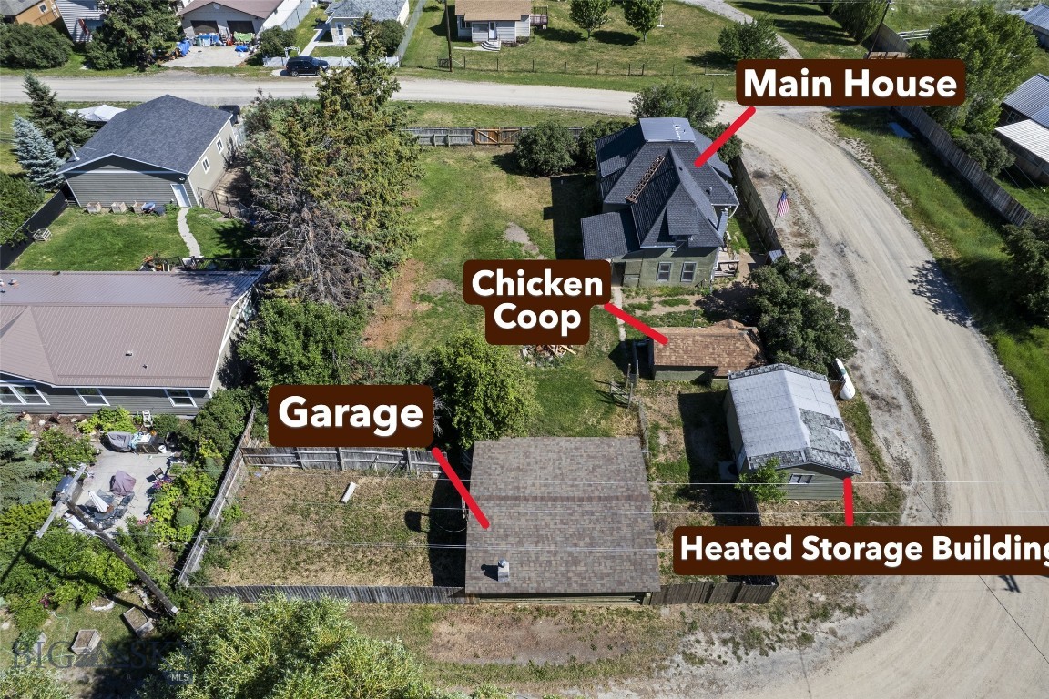 Classic 1910 home, ready for love and creative ideas. This 4-bedroom, 2-bath fixer-upper sits on a large, fully fenced lot directly across from Harrison’s baseball field. Property features a detached garage, on-site chicken coop, heated storage/workshop, its own well, and connection to the Harrison community sewer system — a great canvas for restoring historic character while adding modern comforts.

Harrison is a small, historic community in Madison County with deep agricultural and ranching roots. Established in the late 19th/early 20th century along travel and trade routes to nearby mining and farming towns, Harrison has long been a close-knit rural settlement known for its valley scenery, farming traditions, and community events centered around local schools and sports.

Location to nearby towns

Approximately 20 miles southwest of Three Forks, MT
About 25–30 miles north of Ennis, MT
Roughly 50–60 miles from Bozeman, MT (about 1–1.5 hours by car depending on route and conditions)
A unique opportunity for buyers who want rural Montana living with historic charm and ample outbuildings.