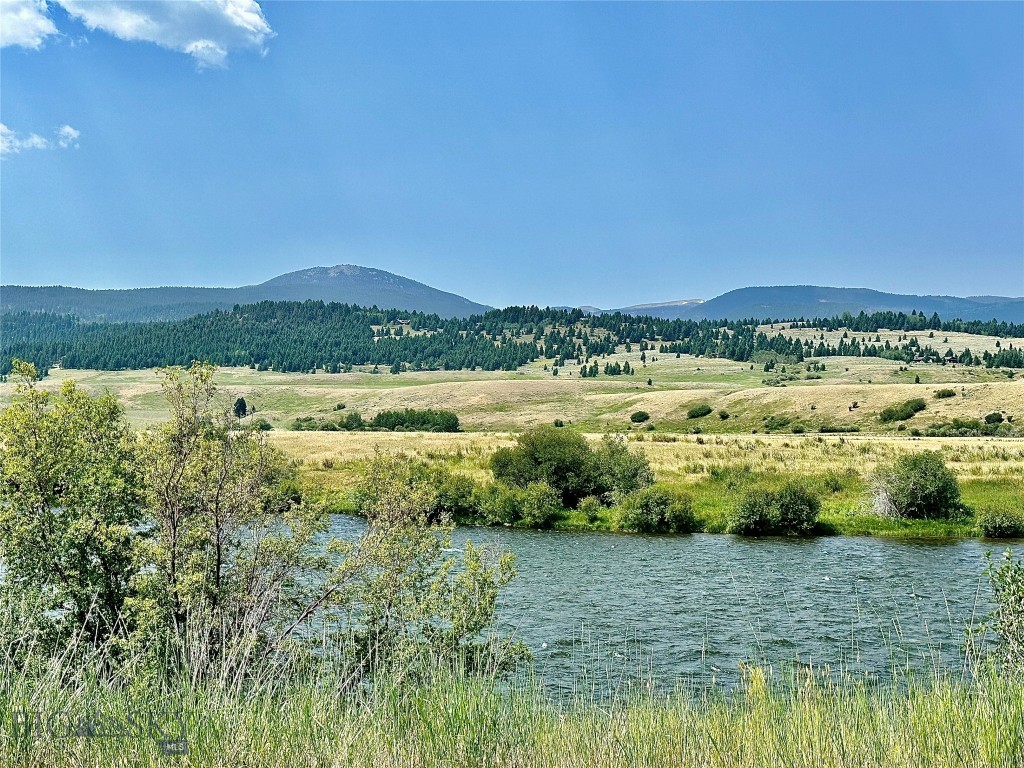 Access to 3 miles of the Madison River for landowners on the 2000+/- acres at Sun West Ranch.  This gated community offers many additional amenities including an Equestrian Center (outdoor arena, round pen, horse barn with tack storage, summer horse program), hiking trails, stocked ponds for fishing, access to hunting, and 1600 open and protected acres for a viewshed.  Imagine watching moose, elk, and deer by day and then enjoying endless starry skies by night.  You are located within one of Montana's greatest recreational areas and you are less than 30 minutes to Yellowstone National Park and just a few minutes to multiple lakes for more water sports.  Enjoy your day everyday as the full time Ranch Managers maintain this exclusive paradise for you giving you the time to just relax and soak in the massive mountain views!
