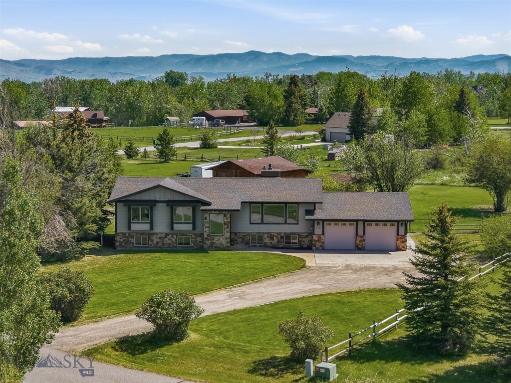 Nestled on 2.12 acres in the highly sought-after Hyalite Foothills neighborhood, and located within the coveted Anderson School District, this inviting 5-bedroom, 2-bath home offers the ideal blend of Montana lifestyle, functionality, and room to grow. With nearly 2,900 square feet of living space, the split-level design creates a comfortable layout for families, entertaining, and everyday living.
The upper level features two bedrooms and welcoming main living spaces, while the lower level offers three additional bedrooms, a beautifully updated bathroom, spacious family room, and dedicated office—perfect for remote work, hobbies, or guests. Recent improvements throughout the home include fresh interior paint, newly stained hardwood floors, new flooring in the family room and office, updated lower-level bathroom, and new doors throughout, creating a move-in-ready feel with thoughtfully updated touches.
Outside, the property truly embraces the Montana lifestyle. Horse-friendly and thoughtfully equipped with a barn, shed, chicken coop, and rabbit hutch, there’s ample opportunity for hobby farming, animals, and outdoor enjoyment. The partially fenced backyard provides flexibility for pets and play, while expansive mountain views serve as the backdrop for everyday living.
Whether you’re looking for space to spread out, room for animals, or simply the peace and beauty of Montana living just minutes from town, this Hyalite Foothills property offers a rare opportunity to enjoy it all at a fantastic price point.