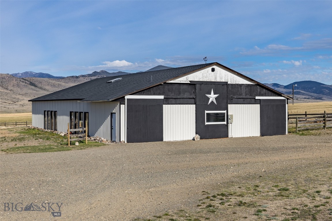 618 Whitetail Road presents a rare Montana live-work opportunity combining a beautifully restored residence, expansive shop infrastructure, and direct access to public land on 40 private acres at the base of the Bull Mountains. Located just six miles north of Whitehall by way of paved roads, the property offers a peaceful rural setting with convenient access to Bozeman, Butte, and Helena, all within approximately one hour. Designed to support a wide variety of lifestyles and operational uses, the property features a fully insulated 4,800 square foot shop complex well suited for equipment storage, fabrication, hobby use, horses, recreational vehicles, or a home-based business operation. The combination of usable acreage, privacy, and flexible improvements creates an ideal setting for entrepreneurs, tradespeople, outdoor outfitters, collectors, or anyone seeking a functional Montana base for both work and recreation.