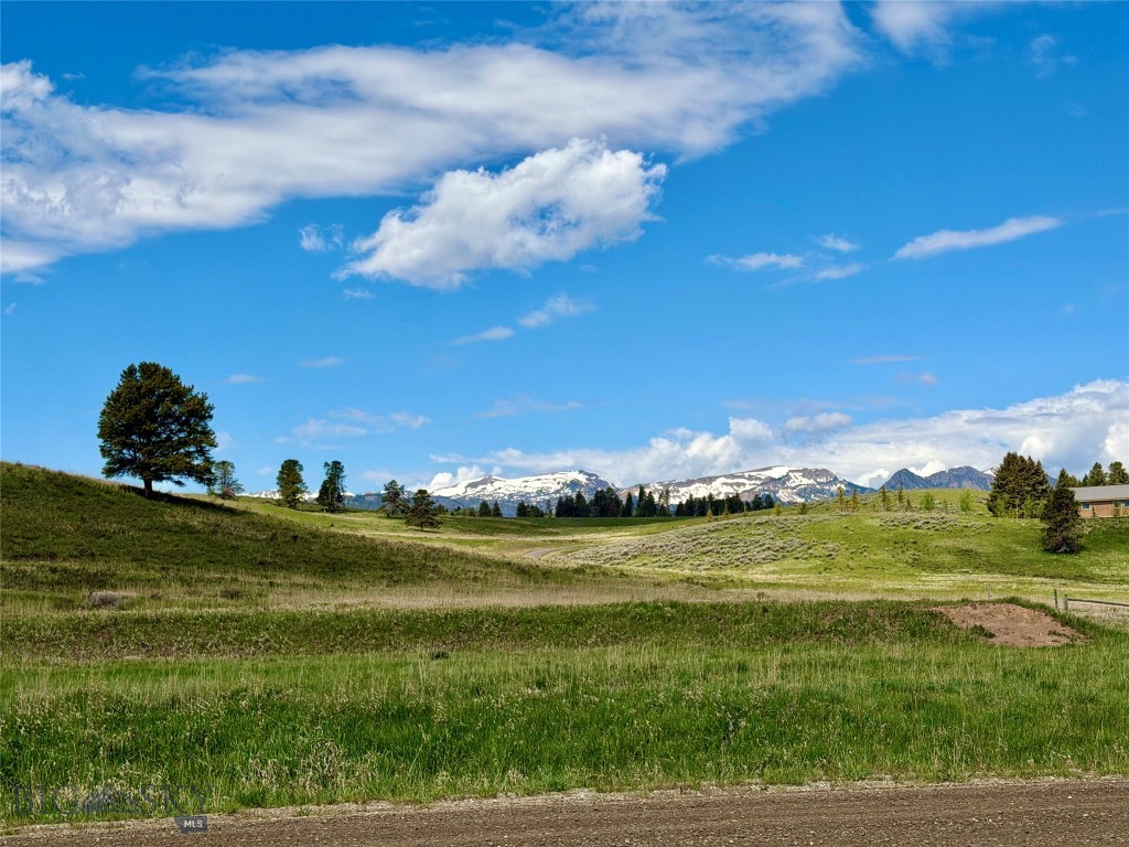 NEW PRICE IMPROVEMENT!   A Wonderful Location to Build your Dream Home or Cabin Getaway.  Less than 15 Miles from West Yellowstone and Iconic YELLOWSTONE NATIONAL PARK!  This Subdivision has Multiple Amenities-  Community Water and Sewer, Electric to Lot.  Subdivision Roads Maintained and Plowed by HOA and Annual HOA Fee is Only $75.00 per Year!  Hebgen Lake Estates is Surrounded by Forest Service Land AND Mountains AND in Close Proximity to Beautiful Hebgen Lake too!   There are Endless Outdoor Activities for All Seasons- Flyfishing the Madison River, Boating on Hebgen Lake, Snowmobiling, Cross-country Skiing, Hiking, and More!  And Short-term Vacation Rental is not Allowed which maintains the Quiet Neighborhood Atmosphere.  Come View!