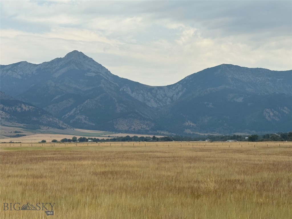 This rare 12-acre parcel offers everything you could want in a Montana property—wide-open space, paved access, and some of the most spectacular views of the Bridger Mountains and Gallatin Valley. The property is ideally located just minutes from Bozeman, with world-class amenities nearby, including skiing, hiking, golf, the Gallatin River, and Yellowstone National Park.

The convenience is unmatched—the airport is only 8 miles away, yet the land retains its private, open feel. Horses are welcome, and thoughtful deed restrictions ensure that nothing will be built to block your sweeping Bridger Mountain views.

A truly special opportunity to own land in the heart of the Gallatin Valley