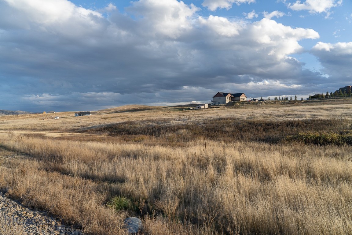 Discover the perfect blend of tranquility and opportunity with this 5-acre parcel nestled in the scenic Rolling Glen Ranch Subdivision, just outside the charming town of Three Forks. This property offers an amazing chance to build your dream Montana home, with plenty of space for a variety of options.  Design and construct your custom home with room for a shop, barn or additional structures - covenants allow for multiple buildings.  Minimal livestock permitted, making it ideal for those seeking a small hobby farm or simply extra space for animals.  Enjoy the wide-open Montana landscape and peaceful surroundings and expansive views.  The adjacent 5-acre parcel is also available for sale offering the potential to expand your property or invest in neighboring land.  Embrace the Montana lifestyle with space and endless possibilities in Rolling Glen Ranch.