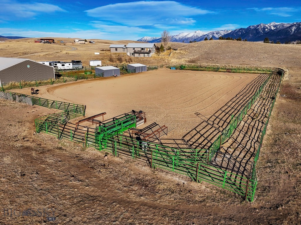 Life is short—don’t miss out on this rare opportunity and all the possibilities this incredible property holds! Whether your dream includes horses, homesteading, rodeo life, outdoor adventure, an investment opportunity, or simply room to breathe under Montana skies, this is the perfect place for so many things.

Set on 20 fully fenced and cross-fenced acres, this property is ready for your animals and your ambitions. Bring the horses, chickens, and farm friends—there’s space for them all! A 48x48 barn with power offers ideal hay and equipment storage, with room to add stalls or tack storage. There’s plenty of space to park trailers, toys, and even a camper, making life here as functional as it is fun.

The 240’ x 140’ roping arena is dialed in with a return alley, lead-ups, adjustable boxes, automatic roping chute, stripping chute, and steer pens. A corral with two 12x24 lean-to shelters and an automatic freeze-free watering system.

Enjoy fishing, rafting, and kayaking on the Yellowstone River, hiking and relaxing soaks in nearby hot springs. Yellowstone National Park is just a scenic drive away. Wildlife frequents the property, and nearby state land provides excellent hunting opportunity

Iconic live music venues close by: The Old Saloon, Chico Hot Springs, Music Ranch Montana and Pine Creek Lodge .

Investor Opportunity: With no CCR's & its prime Paradise Valley location, expansive acreage, and existing equestrian infrastructure, this property offers potential for income-generating uses such as short-term rental, hosted retreats, clinics, weddings, or private events. The combination of privacy, scenic mountain views, ample parking, and ability to add more outbuildings positions this property as a versatile asset with multiple revenue streams—whether as an STR, equestrian-focused destination, or event-based business model.

At the heart of it all sits a 2,944 sq ft, 4-bedroom, 3-bathroom home, perfectly sized for your needs. A greenhouse with an enclosed garden area lets you really lean into the Montana lifestyle. Immerse yourself in the natural beauty & privacy this property offers. Take in the views of the Gallatin & Absaroka Mountains & Emigrant Peak from the covered front porch or the back deck.

This is more than a property—it’s a way of life. Come see it and imagine what you could create here.