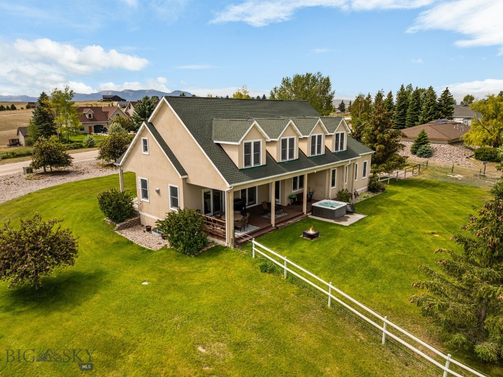 Crisp, clean and absolutely stunning, this beautifully updated home on 1 acre in the Fox Run Subdivision is the kind of property that instantly feels like home. Every detail has been thoughtfully refreshed, from the bright interior paint and updated flooring to the beautifully remodeled kitchen, creating a space that feels timeless, welcoming and impeccably maintained. With just over 4,200 square feet, there's plenty of room for everyone! The heart of the home is the gorgeous kitchen, featuring timeless white cabinetry that goes to the ceiling, subway tile backsplash, stainless steel appliances, a charming breakfast nook, dedicated coffee bar and dedicated pantry that keeps everything organized and within reach. Hardwood floors, a cozy gas fireplace and an inviting dining area anchor the main living space, with doors leading directly to the covered back porch to take in the views. The sizable family room just off the kitchen offers even more room to spread out, relax or entertain. A 3/4 bathroom on the main level is perfectly placed for guests and everyday living. Upstairs, fresh paint and newer carpeting continue the home's bright, polished feel. The spacious primary suite features an en suite bathroom with dual sinks, a large walk-in closet and additional linen storage, creating a comfortable place to begin and end each day. Each of the 3 guest bedrooms is generously sized with plenty of storage. A full guest bathroom and the upstairs laundry room make daily routines that much easier. The basement offers a large unfinished room with the potential for a 5th bedroom, home gym, hobby room or whatever best fits your needs. With abundant storage and additional space ready to be finished, the possibilities are wide open. Outside and you'll find just as much to love. Mature landscaping, underground sprinklers, backyard fencing and sweeping mountain views create an outdoor setting that's every bit as impressive as the interior. Spend summer evenings on the back porch, soak in the hot tub beneath Montana's big sky or simply enjoy the peaceful setting.
Beyond the beautiful cosmetic updates, additional improvements have already been taken care of, including an updated 35 GPM well and corresponding well pump, water heater and water softening system. Complete with a 2-car garage, meticulous care throughout and unforgettable views, this Fox Run home is ready for its next owners to simply move in and enjoy.