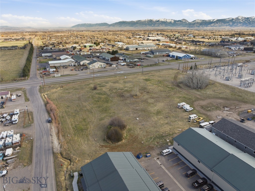 4.65-acre commercial parcel located ¼ mile west of Four Corners on the south side of Norris Road. Flexible zoning supports a variety of commercial or service uses in a rapidly growing area.