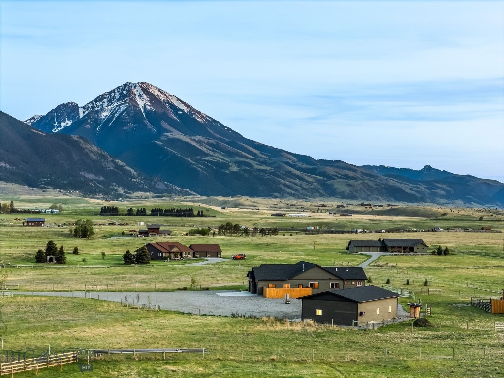 Set against the epic backdrop of the Absaroka Mountain Range, this beautifully crafted 3BD/2.5BA home by R&B Builders offers stunning views, open space, and comfortable living. The home features beautiful trim work, a gas fireplace, a functional floor plan, and is filled with natural light.

The 10-acre property is thoughtfully divided into five sections with cross fencing for irrigation and pasturing, and includes five 16' gates, five walk-thru gates, and a 4-stall loafing shed with hay storage and a tack room. Along with the sale of the property will convey valuable Mill Creek water rights that supply pasture irrigation, along with a complete irrigation setup including a supply riser, 90 sections (over 2,700 feet) of handline pipe, and multiple valves, caps, tees, hoses, and clamps all designed to irrigate the entire 10 acres.

A spacious 30'x50' heated shop with 10' overhead doors offers plenty of room for equipment, toys, or projects, and also includes a dedicated 8'x8' game cooler and A/C unit for those who process their own wild game. The property perimeter is completely fenced with high-tensile smooth wire fencing and grounding rods for hot wire.

Located just 22 miles south of Livingston in the heart of Paradise Valley, this exceptional property places you minutes from world-class blue-ribbon fishing on the Yellowstone River, near endless hiking trails in the Absarokas and beyond, and within close proximity to the north entrance of Yellowstone National Park. Whether you're seeking a full-time residence, recreational retreat, or turnkey horse property, this home delivers the very best of Montana living. Schedule your showing today!