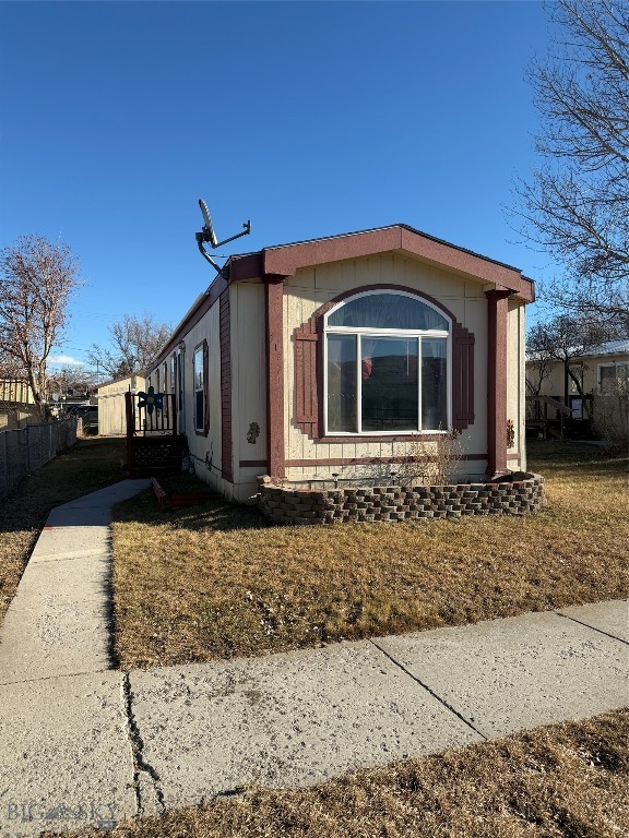 Charming three-bedroom, two-bath mobile home with a spacious layout and great potential. The open living and dining areas provide a comfortable flow, while the kitchen offers ample cabinetry and workspace. The primary bedroom includes an en-suite bath, with two additional bedrooms well-suited for a variety of uses. With some TLC and personal touches, this home presents a wonderful opportunity to add value and make it your own. Outdoor space allows for relaxation or additional enhancements. Property is being sold as-is. Convenient location.