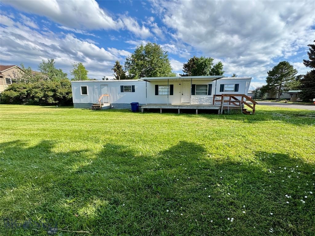 Convenient Bozeman location land and home.  .20 acre lot with 2 bedroom 1 bath mobile home.