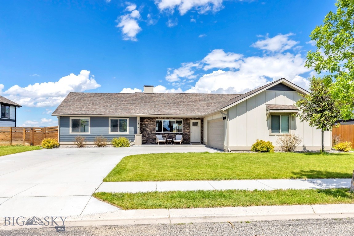 Backing to a sprawling 12-acre neighborhood park, this lovingly maintained single-level home offers the space, functionality, and location you are searching for. The thoughtfully designed floor plan provides excellent separation of space, with the primary suite situated privately on one side of the home and three additional bedrooms on the other. Inside, you'll find an open-concept layout with vaulted ceilings, abundant natural light, stainless steel appliances, soft-close cabinetry and central air conditioning, adding year-round comfort. The oversized, fully fenced backyard is a standout feature, offering direct gated access to the adjacent park complete with trails, playground, sledding hill, and expansive open space. Pet owners will appreciate the custom dog run with convenient access from the mudroom through the garage to the side yard. Situated on a large lot, this property combines the ease of single-level living with exceptional outdoor space and quick access throughout the Gallatin Valley. Move-in ready and meticulously cared for, this home is ready for its next chapter.