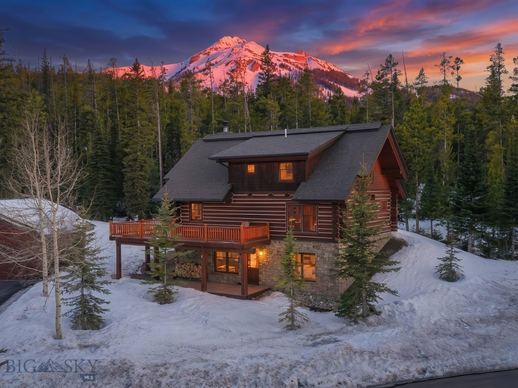 ZoooOOOOOom and whooOOOOOsh down the ski trail directly to your deck, where the hot tub is waiting for you. The next day, ski off the deck down to the White Otter lift and onward to your (and my) favorite ski area: Big Sky Resort. This Powder Ridge cabin features the *ideal* layout for families who travel together: 4 bedrooms including two suites plus two separate living areas (in case the kids and adults are on different party schedules). The forested backyard is truly enormous; the front yard reveals fabulous mountain views of the Spanish Peaks range. This a free-standing condo which means that the HOA maintains the grounds and the exterior of the cabin but you don't share any walls. It's the best case scenario for a vacation home in Montana. The home is offered fully furnished, turnkey, and serviceable for short term rentals, including the hot tub, grill, and lockable closets for all your skis, bikes, golf clubs and requisite vacation gear.