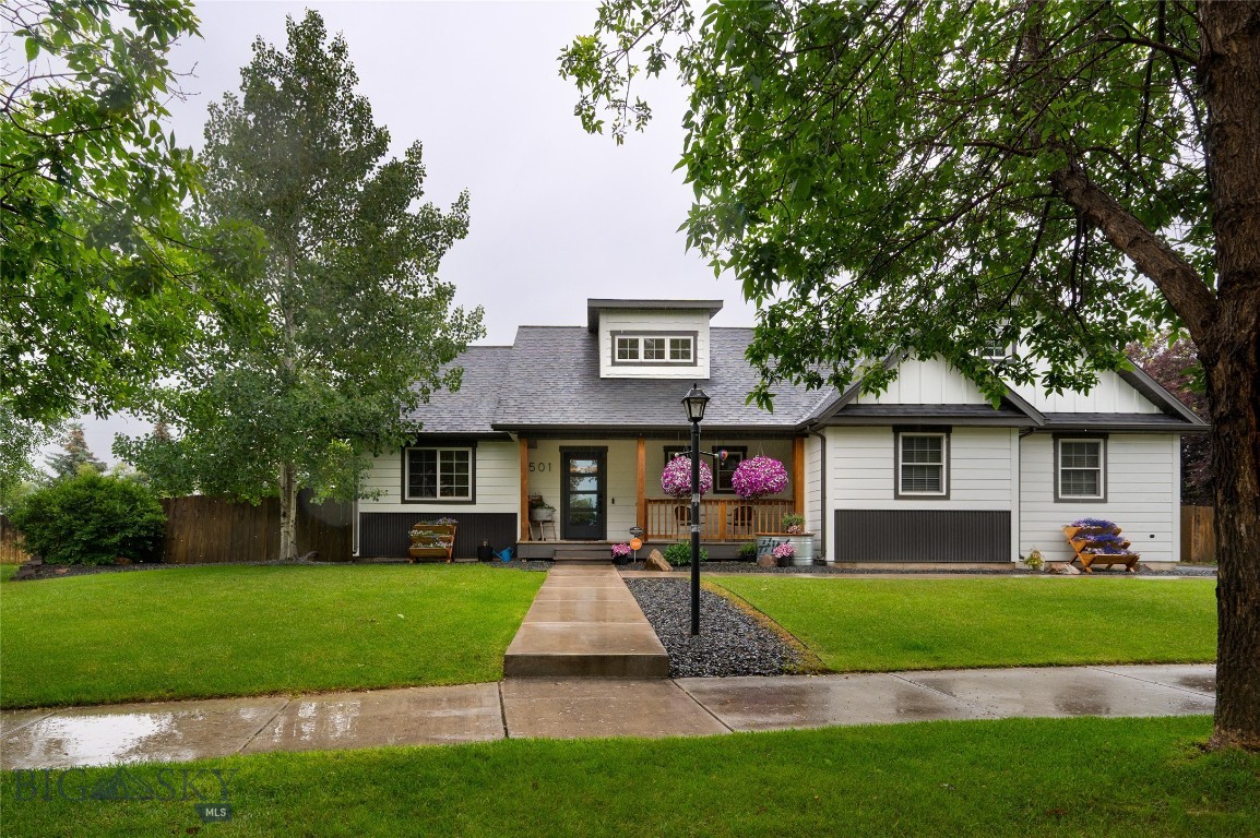 Tucked away on a generous sized lot in the desirable Landmark neighborhood, this beautifully updated and maintained home offers a perfect blend of modern comfort and functional living. The property boasts a fresh, inviting look inside and out, highlighted by a new roof (2025), modern exterior paint, and durable metal siding. Step inside to discover a bright, open interior featuring stylish modern farmhouse touches that are easily adaptable to your own personal style. The spacious layout is designed for effortless living and entertaining.The open kitchen centers around a rare and highly coveted butler