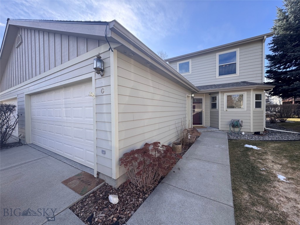 Condo that feels and lives like a house! Quiet cul-de-sac at Bridger Creek Golf Course. Private patios flank living room, dining room and main level primary bedroom. Beautifully maintained and landscaped. Double garage with storage above.