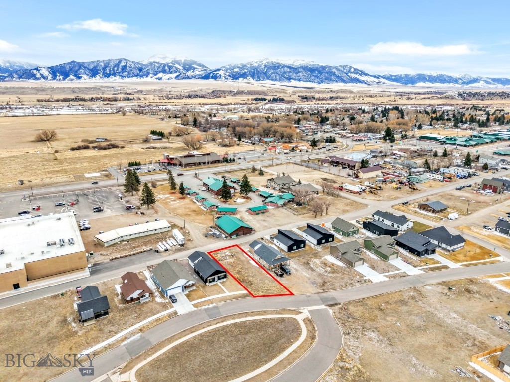 Prime Lot in the Heart of Ennis – Build Your Montana Home! This 6,242 sq ft single-family lot in the North Forty subdivision offers an unbeatable location with walkable access to everything you need. Just steps away from the school, grocery store, hospital, coffee shop, and local restaurants, this lot is ideally situated for convenient living in the vibrant town of Ennis, Montana. Ennis is a gateway to outdoor adventure, located along the legendary Madison River, renowned for its blue-ribbon fly fishing. The area also offers endless opportunities for hiking, biking, hunting, camping, and exploring public lands, making it the perfect place to live, invest, or build your vacation getaway. With water and sewer already stubbed to the lot, your building process will be faster and more efficient. Whether you're planning your forever home or an income property, Lot 12A is a rare opportunity in one of Montana’s most charming small towns in the Greater Yellowstone Region. Only 1 hour from Bozeman.