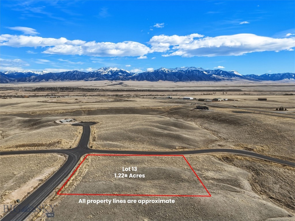 Lot 13 offers 1.22± acres within a thoughtfully planned 55-lot community, with parcels ranging from approximately 1 to 2 acres. The subdivision spans 165± acres total, providing generous open space and excellent opportunities to enjoy local wildlife. Paved roads are in place, with mailboxes, power, and fiber optic service to each lot. Located approximately three miles from downtown Ennis, this property offers sweeping views in all directions and convenient access to town amenities. Wells throughout the subdivision range from approximately 200 to 350 feet in depth, producing 12 to 60± GPM. The licensed Montana listing agent is a member of the selling entity.