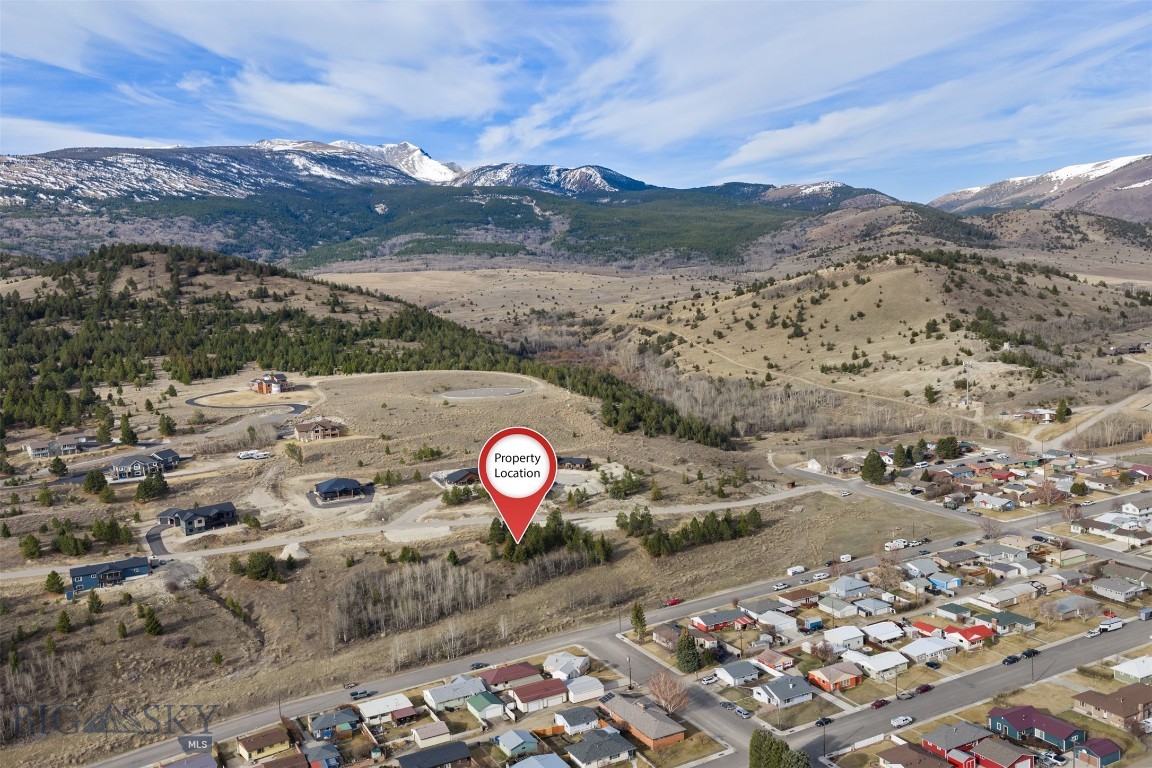 Build your dream home in this desirable hillside subdivision in Anaconda. This 0.399-acre lot comes ready for your vision, with city water and sewer, natural gas, and electricity all available at the property—an exceptional convenience that makes building easier and more affordable than lots without direct access to utilities. Enjoy amazing views in every direction—with no homes directly in front of you to block your scenery, the setting feels open, airy, and full of potential. Located in a new and growing neighborhood, this is a rare opportunity to secure a premium homesite and bring your dream home to life.