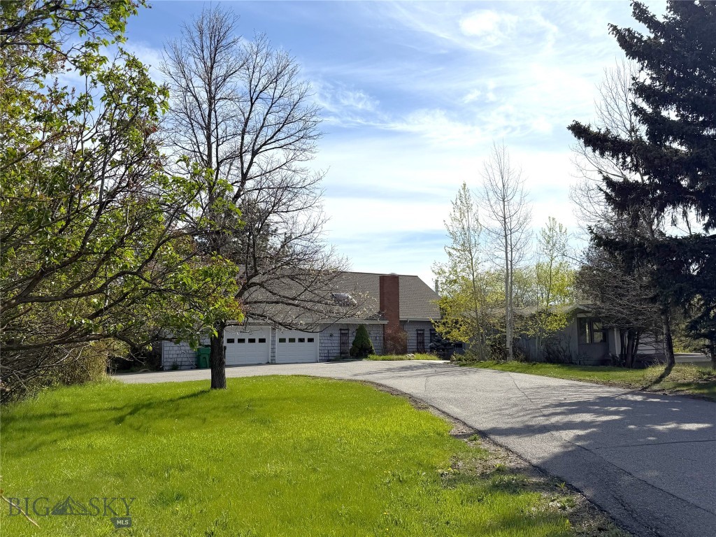 Have you been waiting for one of Bozeman’s most unique and picturesque properties to come on the market?  This just may be it!  Boasting approximately 3.868 acres of natural Montana beauty, located within city limits, this real estate offering will have you dreaming of the endless possibilities. This breathtaking property offers the perfect blend of privacy, natural beauty, varying topography and a prime location. The private, park-like property features a serene creek meandering through the backyard, surrounded by mature aspens and various other established trees that provide both beauty and privacy year-round.  This listing is the ultimate package, which combines two separately deeded parcels ~ one that is also listed as MLS #408799 (the single family home situated on approximately 2.472 AC) and the vacant land parcel listed as MLS# 409413 (approx 1.396 AC).  Situated in the heart of Bozeman, within close proximity to many amenities such as the hospital, MSU, local restaurants, Main street, trails, schools, shopping and so much more ... it offers a rare opportunity to capture Montana's beauty in your backyard, all while being close to so many amenities you likely desire.  The home has a spacious living room, expansive flex space with wet bar, primary bedroom with fireplace, totaling four bedrooms (some are non-conforming), two full baths and a 3/4 bathroom.  With an oversized two car garage (workshop space on the side), there is a lot of potential here!  The approximate 3.868 acres is a haven for local wildlife including black bears, an abundant numbers of whitetail deer, various species of fowl and even the occasional wild turkey.  It's a rare blend of in-town convenience and a true connection to nature. With plenty of space to build an additional home or simply preserve your surroundings, this property is a rare find in Bozeman. Peaceful, scenic, such a variety and full of potential ~ take this opportunity to make it all yours. 
Yes, the private tennis court (shared between the two separately deeded parcels) is unique and you would have the flexibility to remove it, resurface it, create an ice skating rink or maybe make it into pickle ball courts.  The choice is yours! 
Pictures do not do it justice ~ you need to see it with your agent to really feel the gravity of how amazing it is ~ schedule your private showing today!
Disclosure: Listing agent has ownership in property