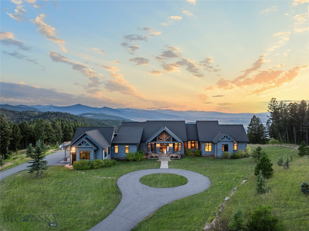 This extraordinary 146± acre estate is the crown jewel of North Pass Ranches, Bozeman’s premier, gated luxury ranch community. Ideally situated just 15 minutes from downtown Bozeman, this legacy property offers a rare combination of privacy, accessibility, and unmatched natural beauty. As the original founder’s location and the most coveted site within the ranch, it occupies a commanding ridgeline with panoramic views stretching across the Gallatin, Madison, and Tobacco Root ranges, as well as the iconic Absaroka-Beartooths and the sweeping Bozeman valley below.

At the heart of the property lies a masterfully updated 8,000± square foot main residence, designed to inspire. Soaring ceilings up to 31 feet frame expansive living spaces, anchored by a gourmet chef’s kitchen outfitted with top-tier appliances and a dramatic main-level primary suite featuring a spa-caliber en suite bath, oversized walk-in dressing room, and a striking fireplace. Finishes throughout speak to a refined mountain aesthetic—leathered quartzite countertops, reclaimed oak ceiling beams, custom light fixtures, and premium designer details at every turn.

A separate 3,000± square foot guest house includes 4 bedrooms, 3 bathrooms, and an attached two-car garage, offering space for extended family, friends, or on-site staff. Designed for the equestrian enthusiast, the property features a heated 14,560± square foot indoor riding arena with five stalls, two foaling stalls, a tack room, bathroom, kitchen, and ample equipment storage. The grounds include brand-new fencing, multiple pastures, and direct access to miles of private riding and hiking trails that wind throughout North Pass Ranches and into State of Montana land.

Owners within the ranch community enjoy over 9 miles of private trails, stocked fishing ponds, a full-time on-site ranch manager, and shared amenities ideal for gathering, recreation, and solitude alike. Wildlife abounds—moose, elk, deer, and bear are regular visitors—enhancing the deep connection to nature this property offers.

This is more than just the finest location within North Pass Ranches—it’s a rare chance to secure a legacy estate in one of Montana’s most sought-after landscapes. The blend of luxury, land, and location simply has no equal. As an added advantage, Montana has no sales tax, making ownership even more appealing for buyers seeking both an extraordinary lifestyle and meaningful financial efficiency.