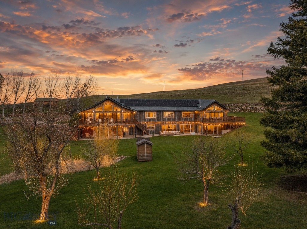 Three miles up Swingley Road, you’ll find a Montana property with soul. Set on 38 secluded acres, this horse property brings together rare privacy, year round live water, a spring fed pond, unobstructed views and a deep connection to the land. The drive in feels almost magical, winding from the foothills of the Absarokas toward the West Boulder through some of Montana's most beautiful ranch country. With a main house, guest house, live water, beautifully fenced pastures, a spring-fed pond, historic outbuildings, a barn, corrals and sweeping views of Livingston Peak, it offers a sense of place that has become increasingly rare. 

Originally homesteaded in the late 1800s, the land carries the grace of its western past: old-growth cottonwoods, 100 year old willows, open meadows, several weathered original structures, big skies and room to breathe. Completely fenced for horses, with water rights, no covenants and no zoning, the property is rich with freedom and possibility.

The 6,300-square-foot main house includes a main floor primary suite with full spa bath, 4 additional bedrooms, two and a half baths, two kitchens, two living rooms, a media room, a large game room or gathering space and an additional gym space with an indoor sauna. The property also features a whole-home solar array with battery storage and a Generac standby generator for complete energy independence. The 450-square-foot detached guest quarters (with 450sf basement) adds flexibility for visitors, caretakers or creative use.

The main house invites a full renovation with so many possibilities...legacy retreat, high-end vacation rental, private ranch, vacation escape, multi-generation living or a full-time residence. What remains here cannot be recreated: land, water, history, privacy and a true connection to Montana’s western landscape. No covenants, no zoning. Seller financing offered. Please do not drive into the property w/out permission.  Google maps does not take you to the correct property.