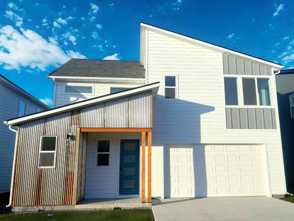 This two-story home is designed with everyday living in mind. With 4 bedrooms and 2.5 bathrooms, there’s plenty of space for family, guests, or a home office. The main floor features an open layout with a bright kitchen, roomy island, quartz counters, and stainless steel appliances. It flows right into the dining and living areas, where a cozy fireplace and patio access make it easy to relax or entertain. Upstairs, the primary suite has its own bathroom and walk-in closet, plus three more bedrooms and a laundry room for convenience. An oversized two-car garage gives you extra room for gear and storage. NOW OFFERED WITH FRIDGE, WASHER AND DRYER. Northwest Crossing is more than a neighborhood—it’s a community. With parks, green spaces, future shops and cafes, plus quick access to downtown Bozeman, Bridger Bowl, and Big Sky, you’ll have the best of Montana right outside your door. Come see why this home is a great fit for both comfort and adventure!