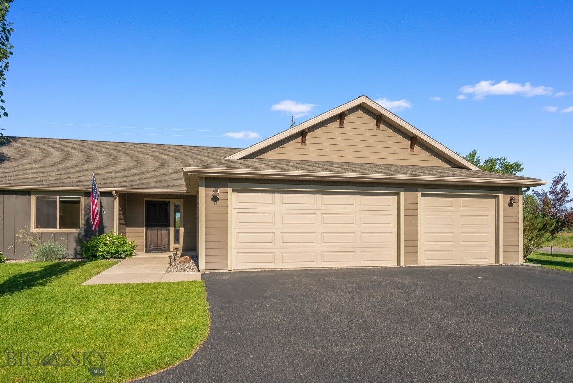 Absolutely MINT Single story with 3 car garage! Large fenced in backyard looking out over unbuildable land with trail system. Extremely open floorplan with 10 foot island, large breakfast room, vaulted ceilings and fireplace! Split bedroom plan with gigantic master suite with sliding doors out to a large deck perfect for a hot tub. Backyard is fully fenced and also has a large patio with tons of backyard landscaping. End unit that lives like a single family house in a small cloister of only 4 units. Convenient to everything and the new Rosauers grocery store is 10 minutes away. Walk behind your house to hiking trails this is the perfect fit for someone that does not want stairs and needs a 3 car garage.