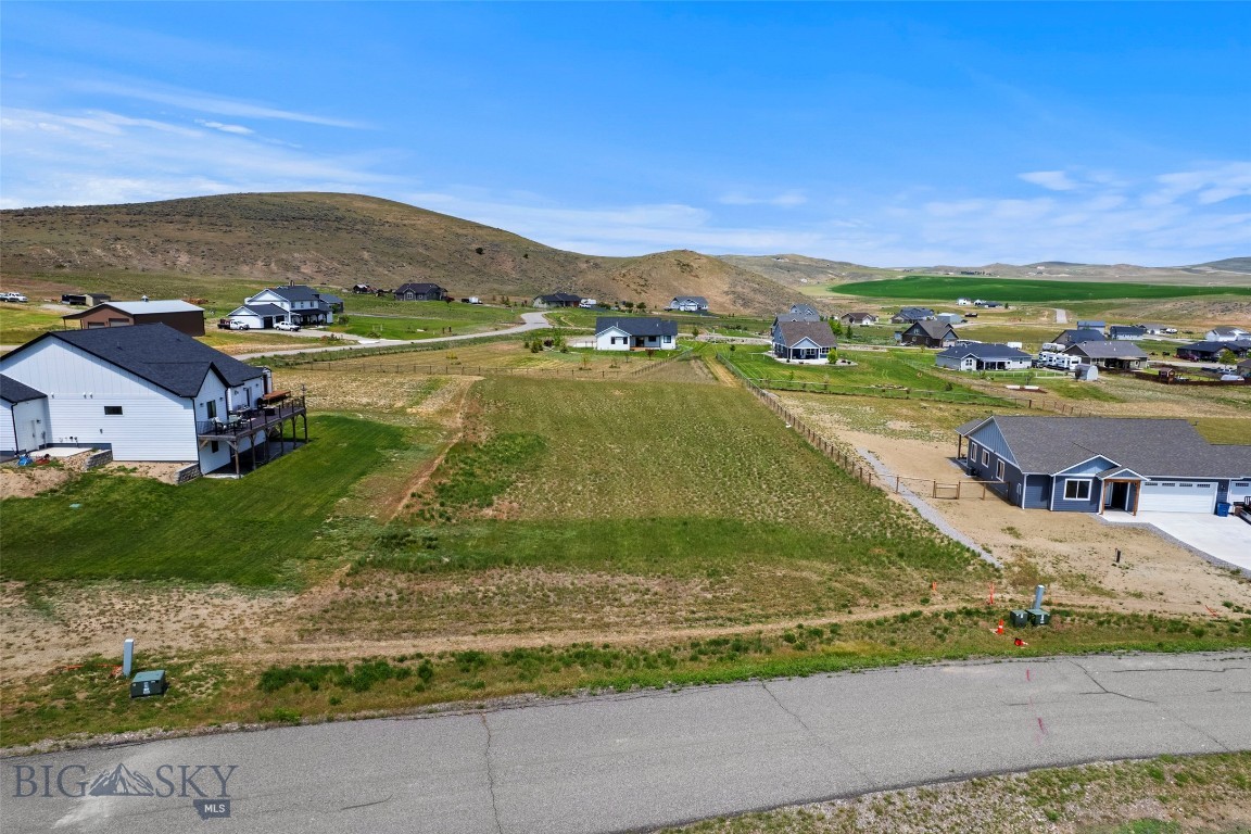 This 1.01-acre vacant lot in The Village at Elk Ridge offers the elbow room, views, and quiet setting that make Three Forks such a sought-after place to put down roots. With level ground this parcel offers a great spot to build your Montana dream home.

The Village at Elk Ridge is a well-kept subdivision with paved roads, quality homes, and a peaceful rural feel.  Just minutes from Three Forks, the Missouri River, golf, fishing access, and endless outdoor recreation. Bozeman is an easy commute, giving you the perfect balance of space and convenience.

Whether you’re dreaming of a modern farmhouse, a simple getaway, or a Montana-rustic build with room for toys and hobbies, this lot gives you the foundation to create it.