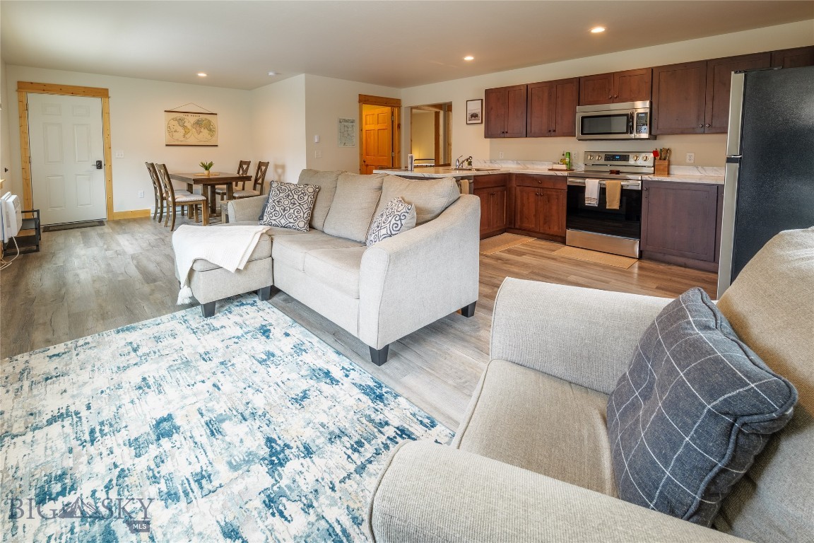 Discover a world of possibilities with this exceptional property. Whether you’re looking to own a flourishing vacation rental business or explore long-term rental options, this prime location just outside Yellowstone National Park offers unmatched potential. Built in 2020, the property features four fully-equipped, turnkey apartments with impeccable design. Each unit includes two bedrooms, a full bath, upscale finishes, in-unit laundry, and tasteful furnishings with all essential appliances.

Accessibility is a key feature, with one ground-level unit being ADA compliant, while all units offer spacious doorways and single-level living for added comfort. Located just steps from the stunning Yellowstone River, the historic Roosevelt Arch, and Yellowstone National Park’s only year-round entrance, this property boasts an unbeatable location, providing easy access to the region's diverse amenities throughout the year. Seller financing is possible.